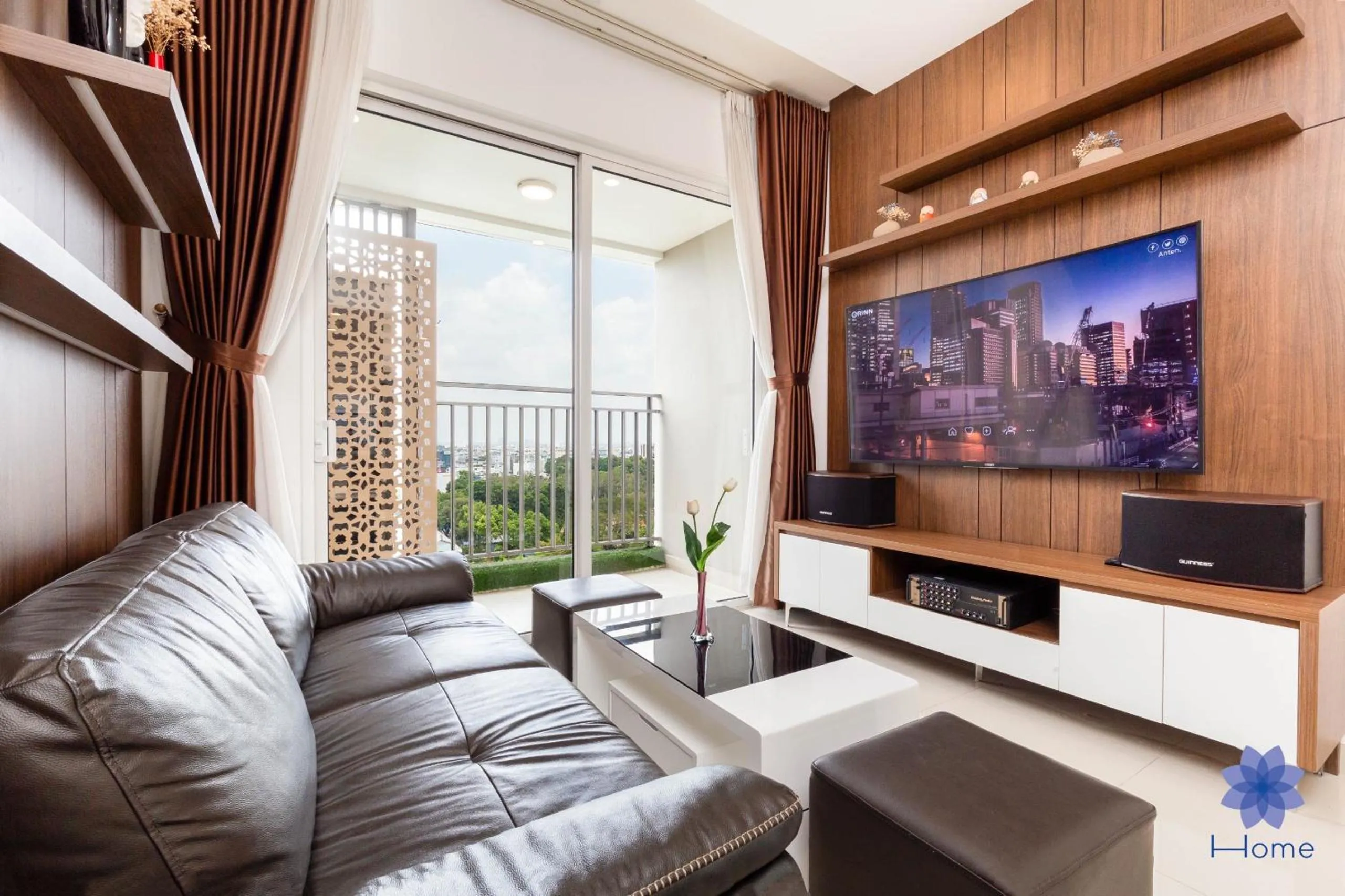 TV and multimedia in iHome Furnished Apartments with Free Gym & Pool, Airport Pick-Up Service