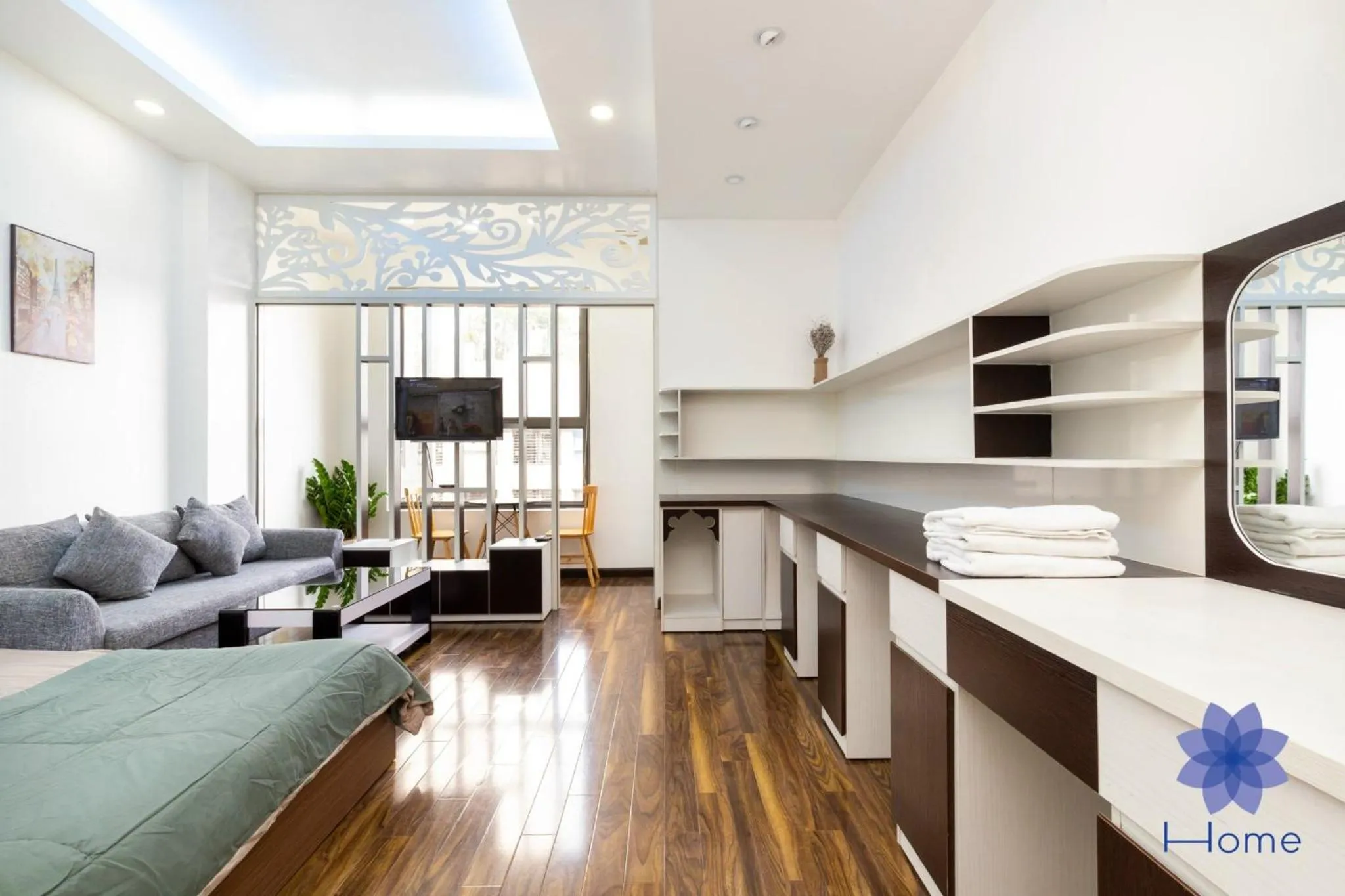 Living room in iHome Furnished Apartments with Free Gym & Pool, Airport Pick-Up Service