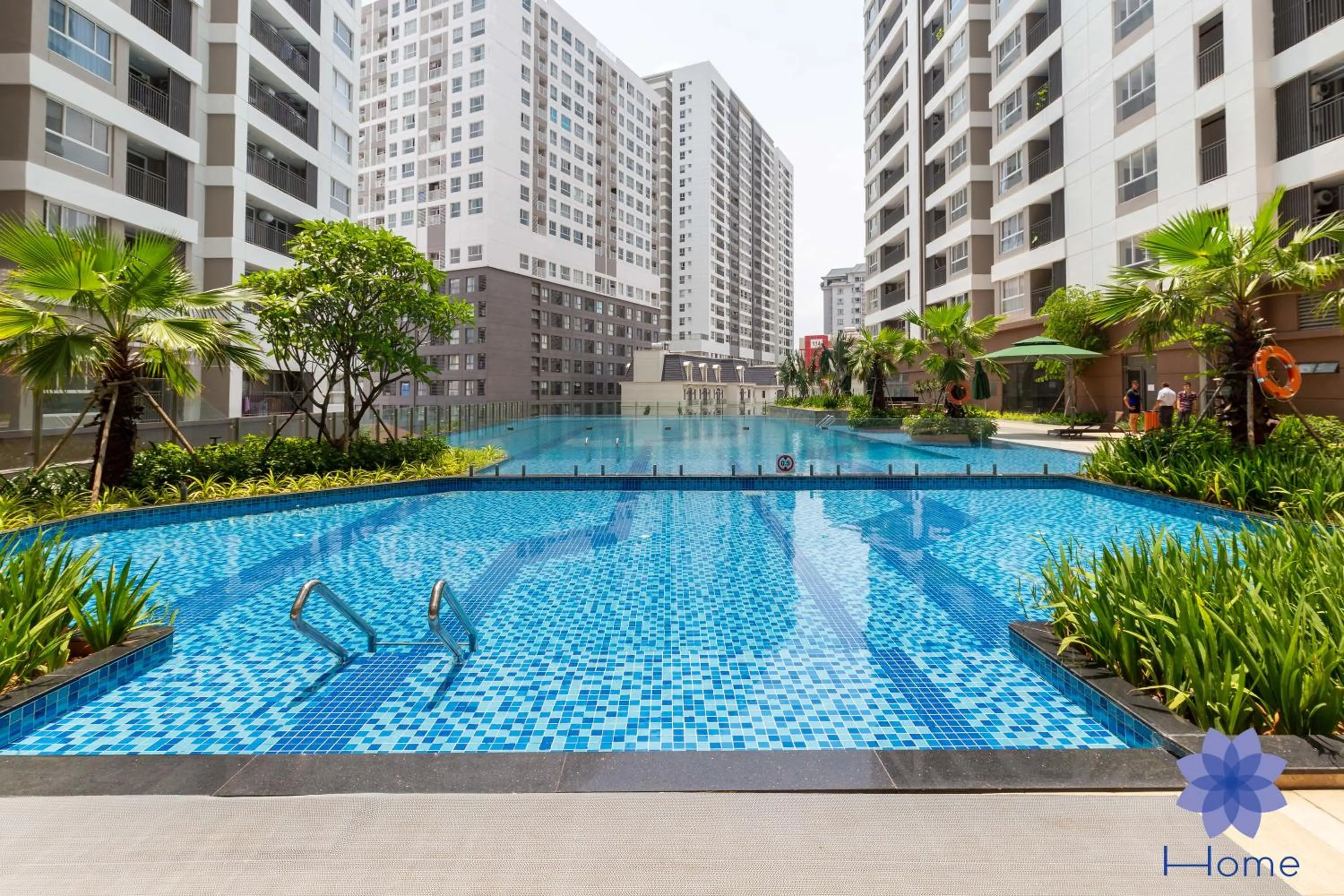 Swimming pool in iHome Furnished Apartments with Free Gym & Pool, Airport Pick-Up Service