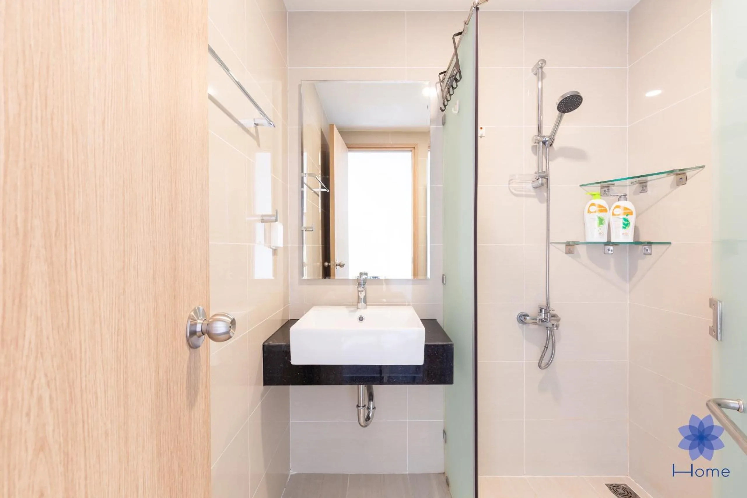 Shower in iHome Furnished Apartments with Free Gym & Pool, Airport Pick-Up Service