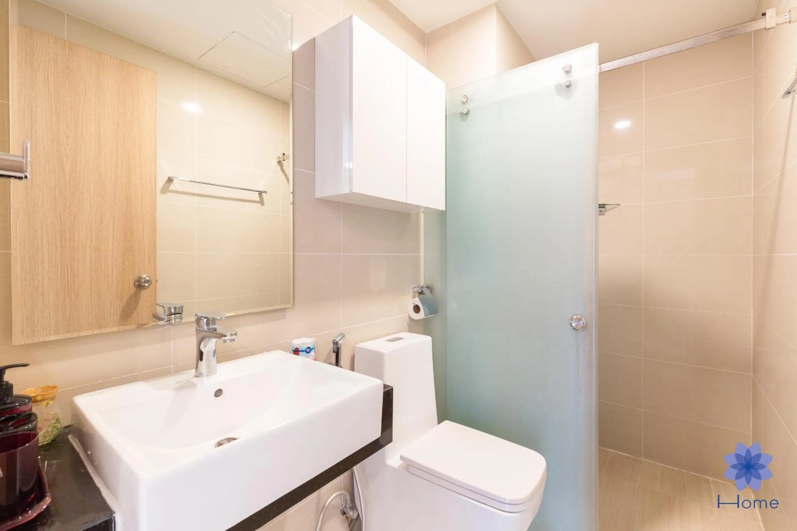 Shower in iHome Furnished Apartments with Free Gym & Pool, Airport Pick-Up Service