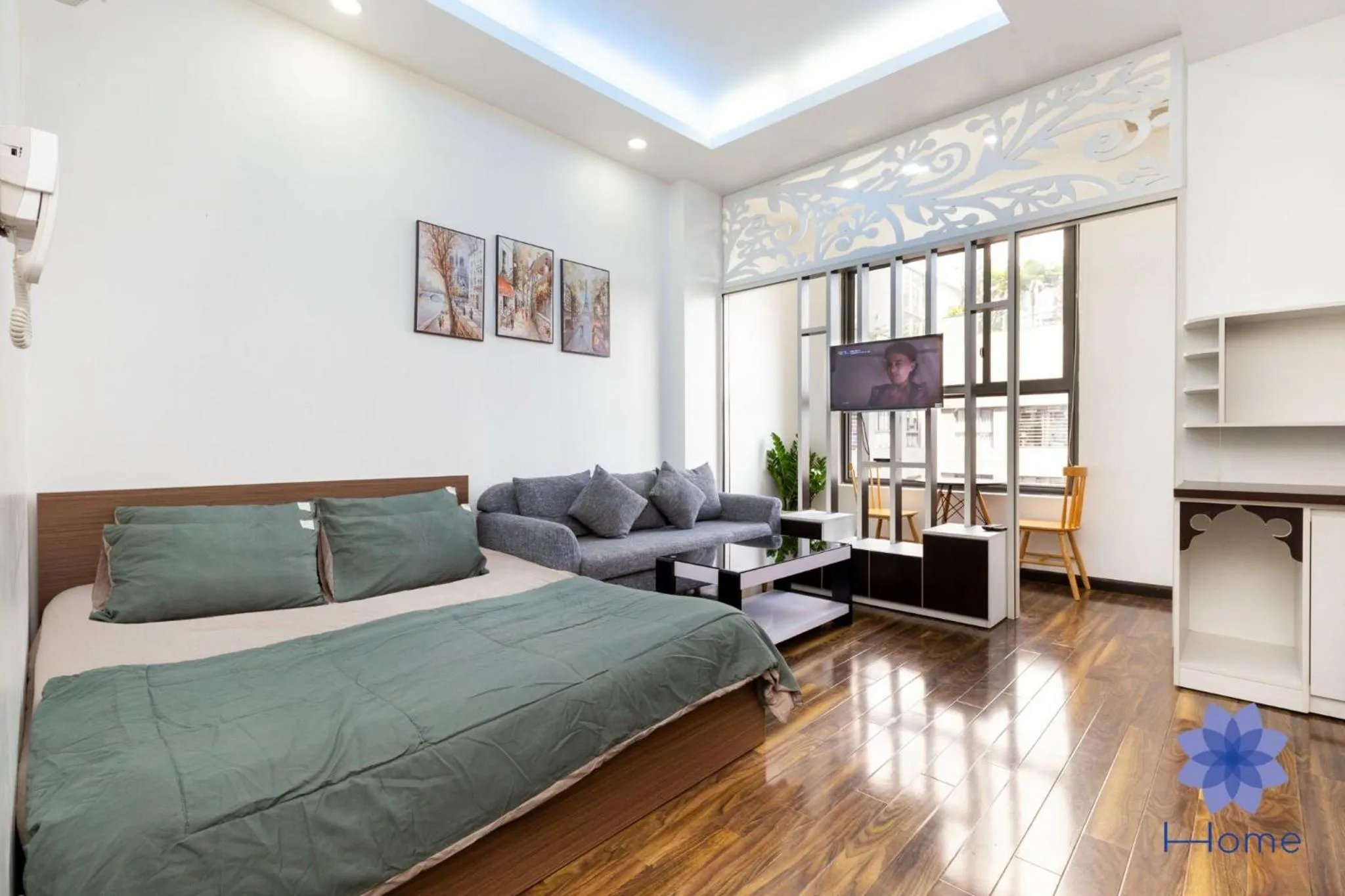 Living room in iHome Furnished Apartments with Free Gym & Pool, Airport Pick-Up Service