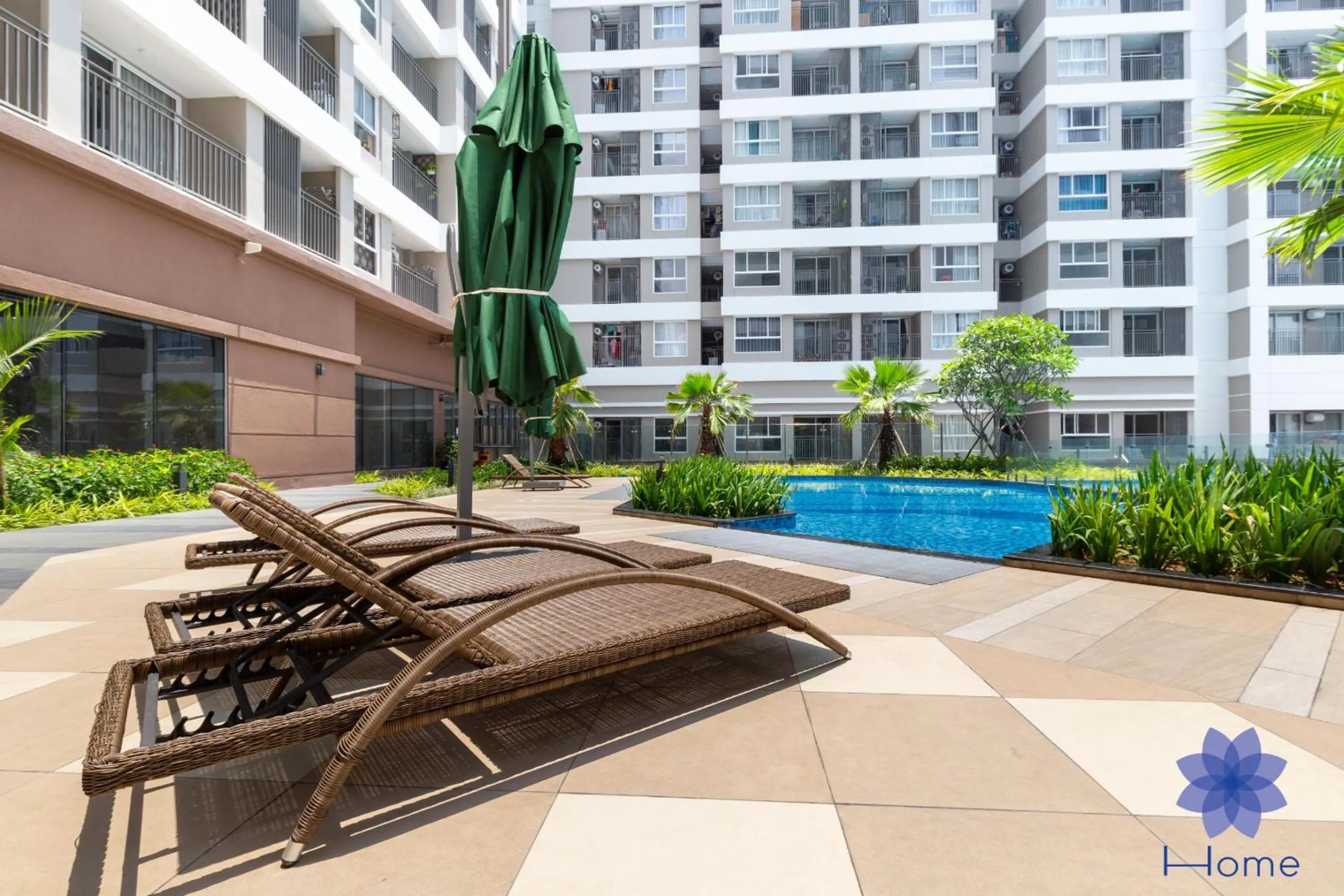 Swimming pool in iHome Furnished Apartments with Free Gym & Pool, Airport Pick-Up Service