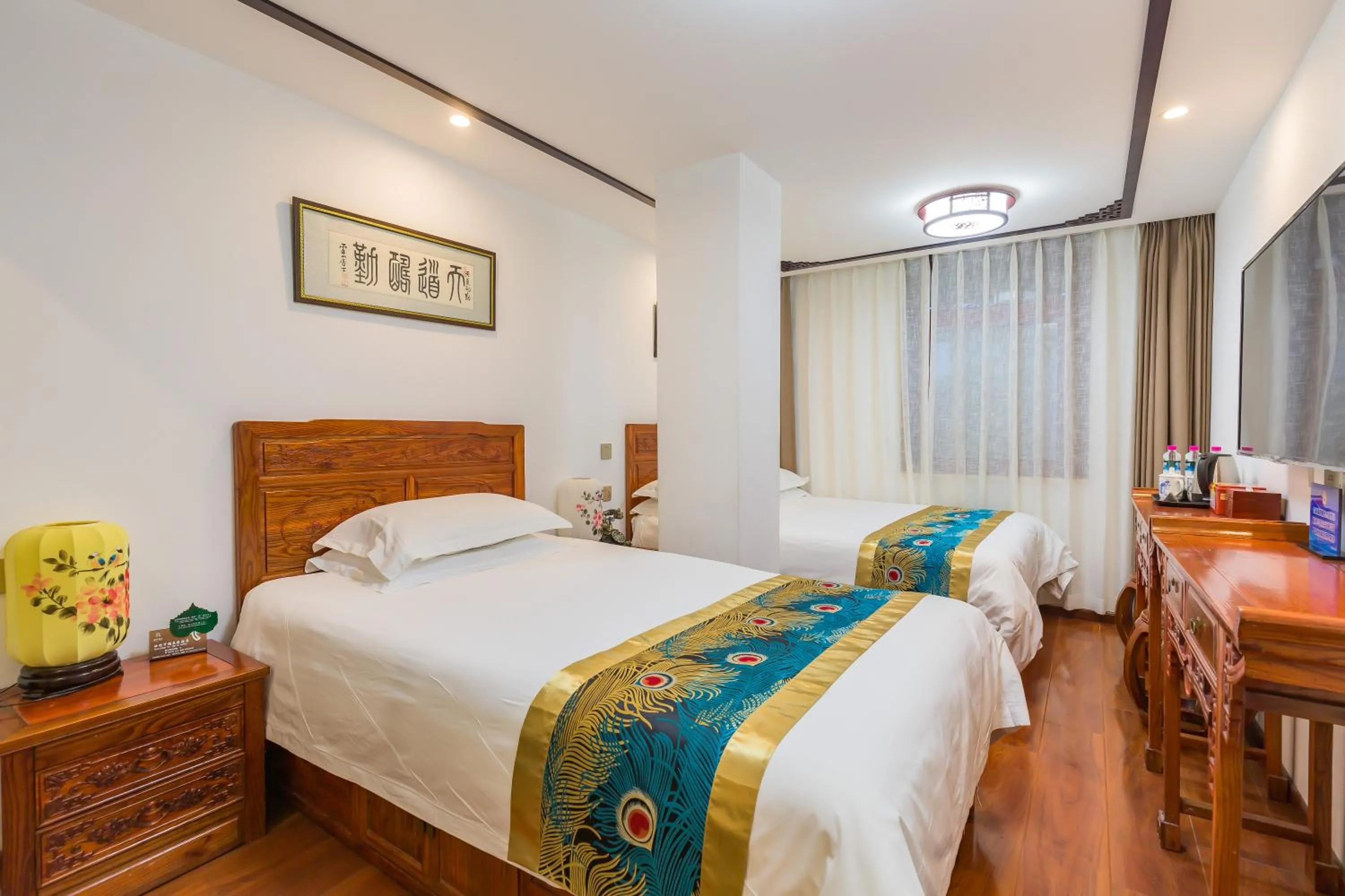 Bed in Qinfu Hotel Beijing Nanluogu Lane Houhai