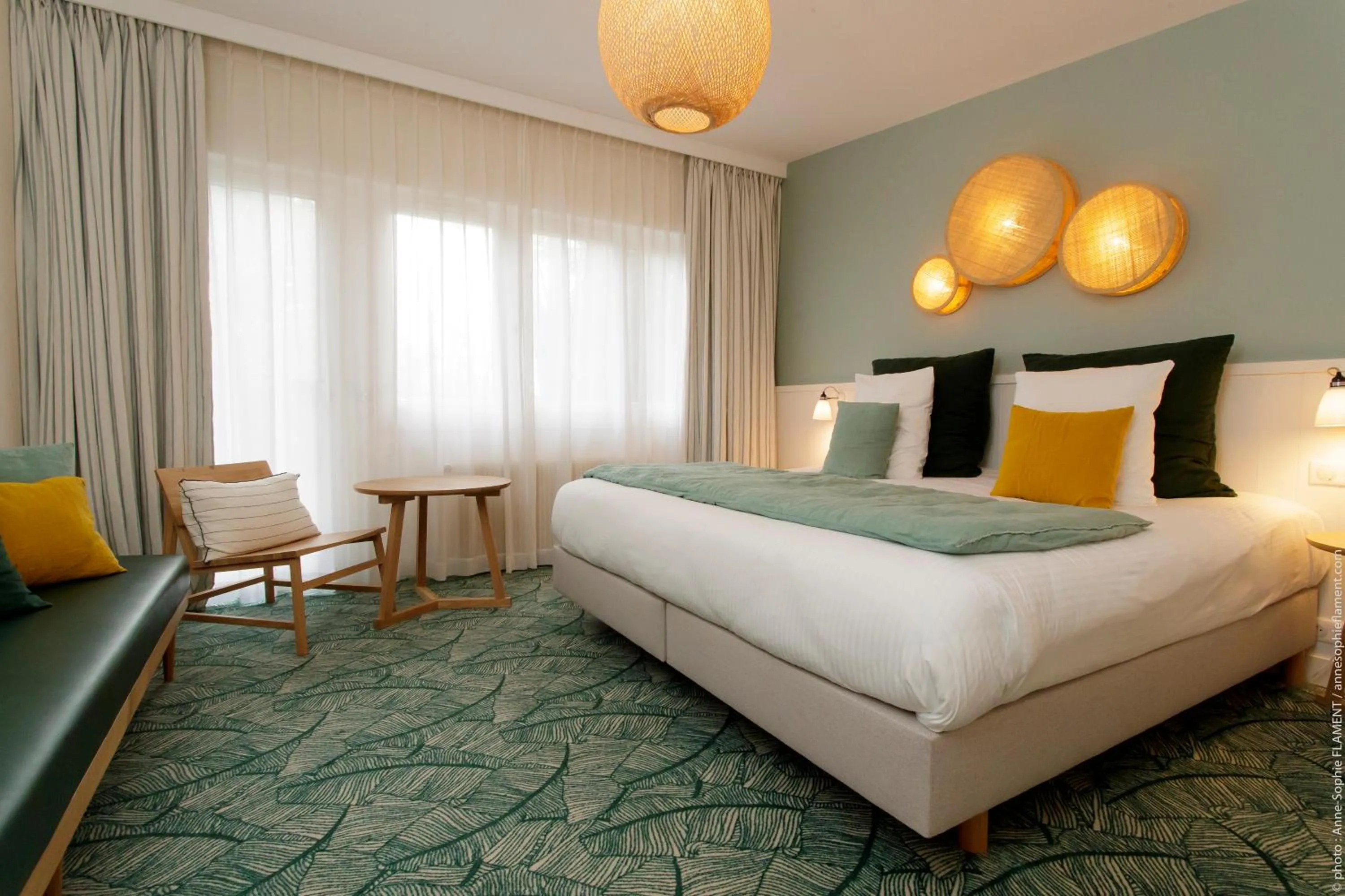 Bed in Le Manoir Hôtel