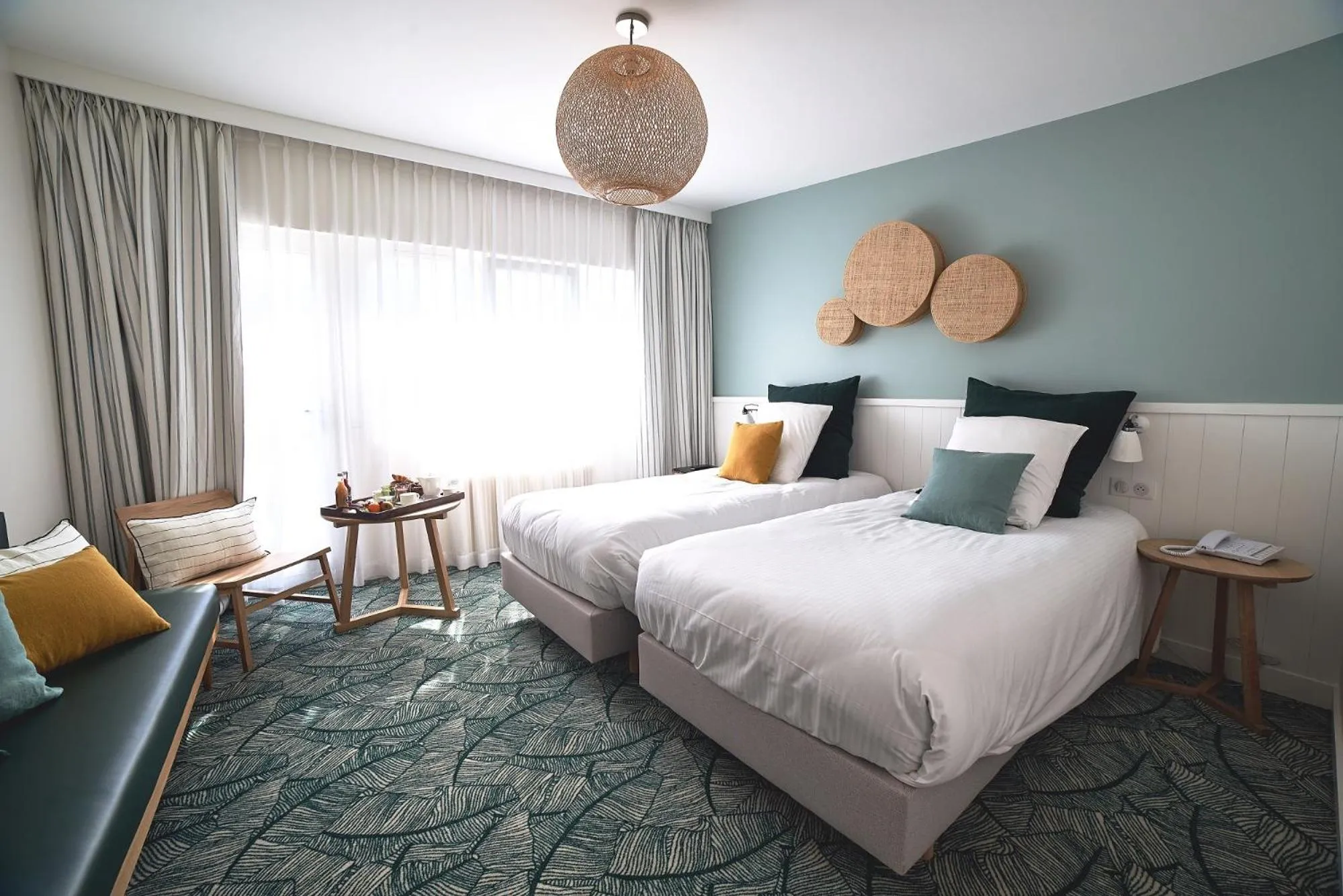 Bed in Le Manoir Hôtel