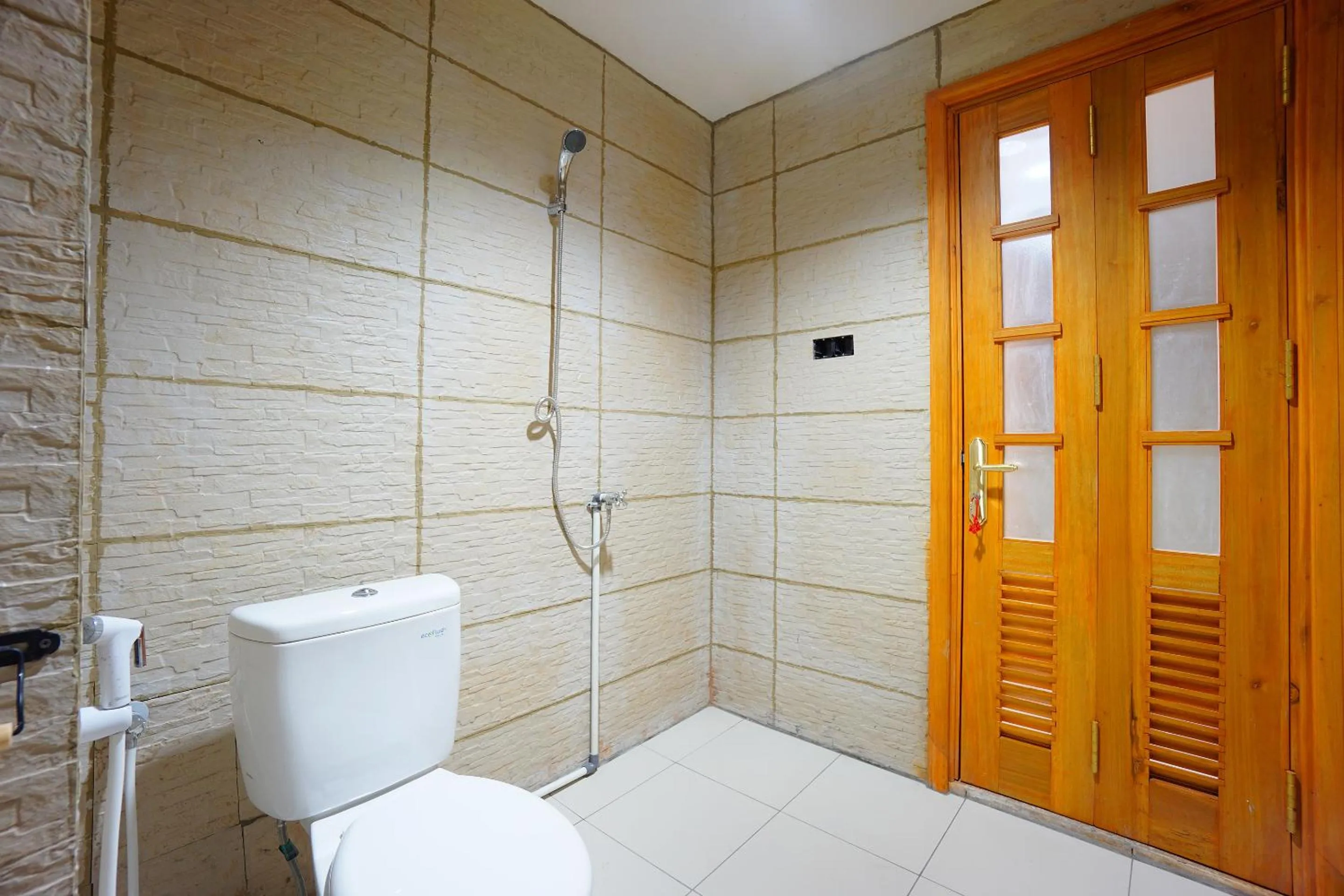 Bathroom in RedDoorz Brand MAN12045 RedDoorz near Megamall Manado