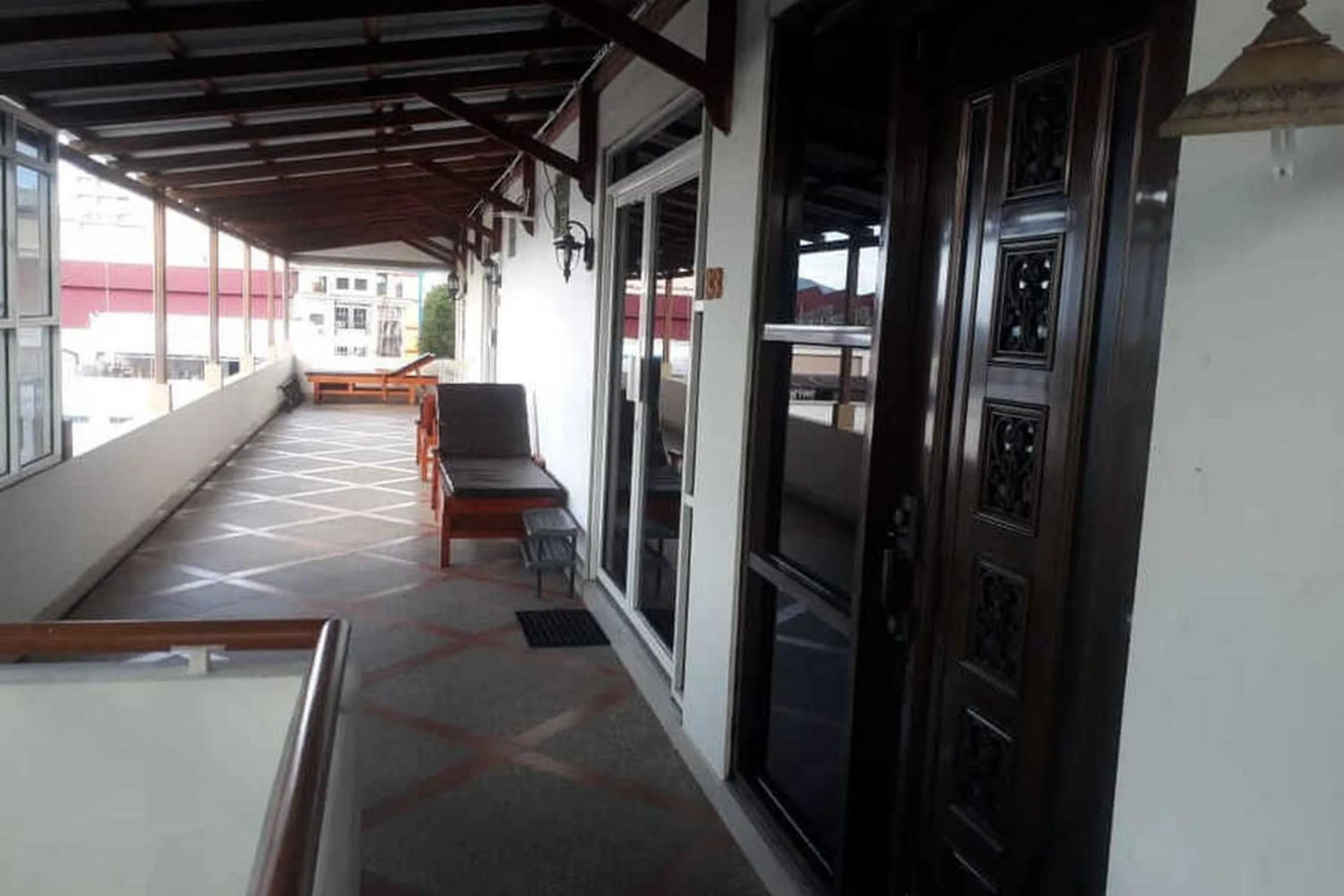 Seating area in RedDoorz Brand MAN12045 RedDoorz near Megamall Manado