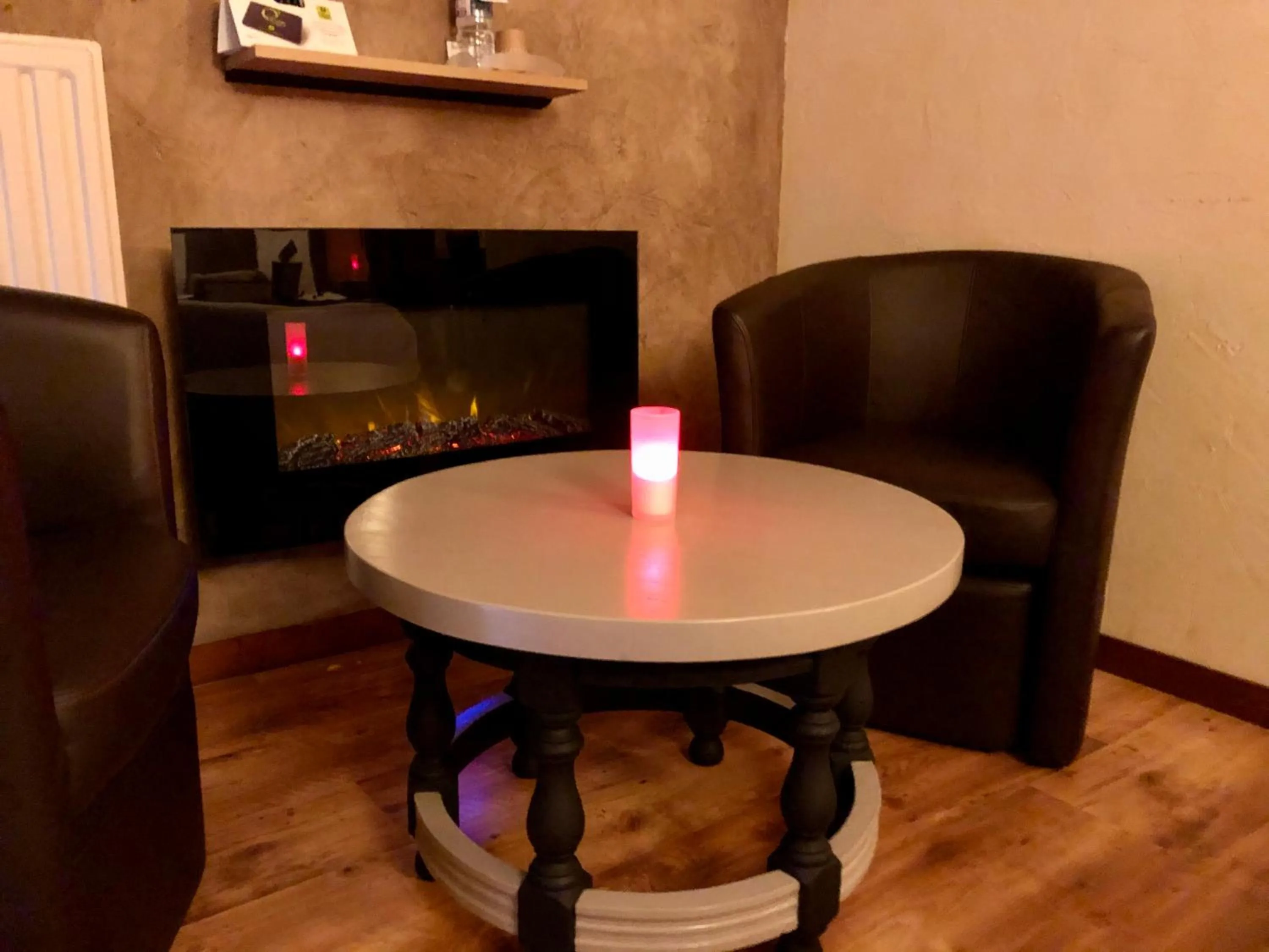 Seating area in Logis Hotel Oasis