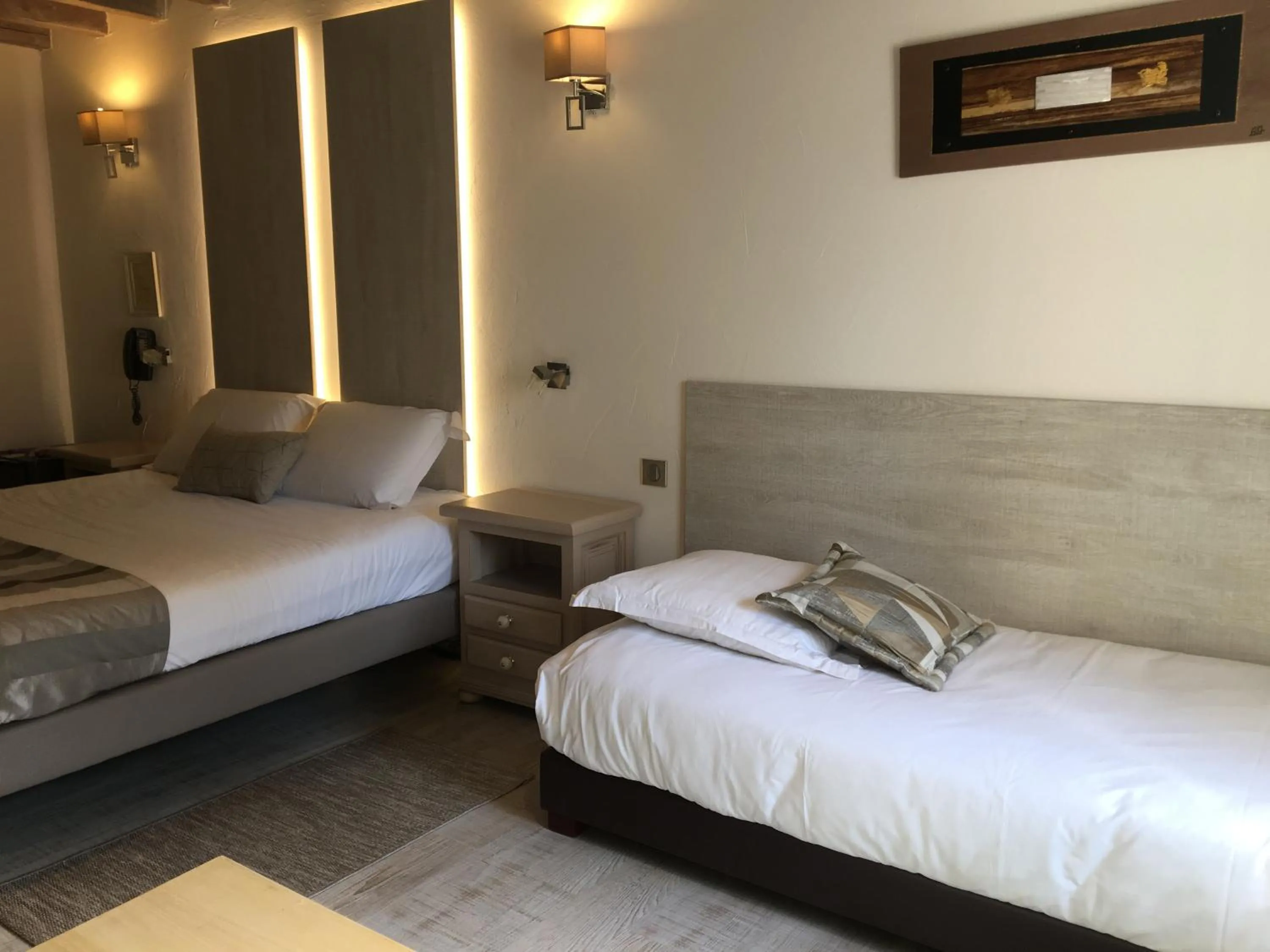 Photo of the whole room, Bed in Logis Hotel Oasis