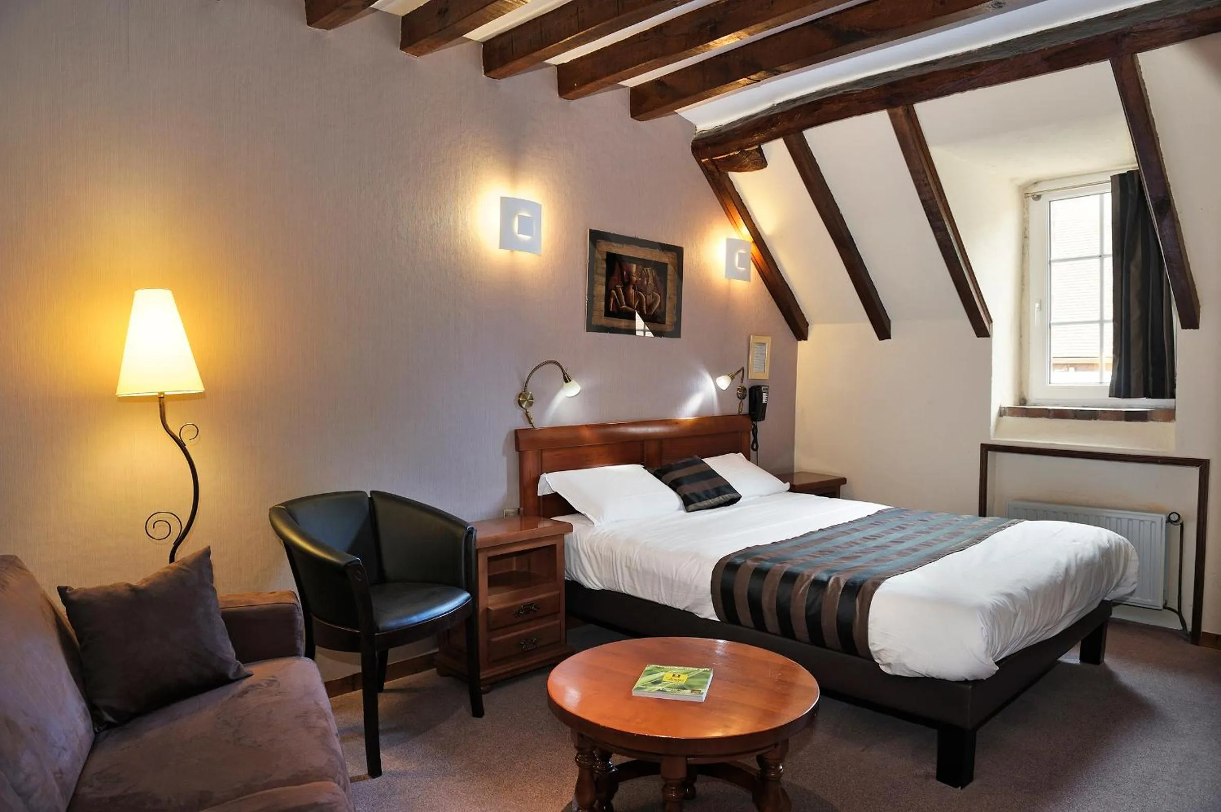 Photo of the whole room, Bed in Logis Hotel Oasis