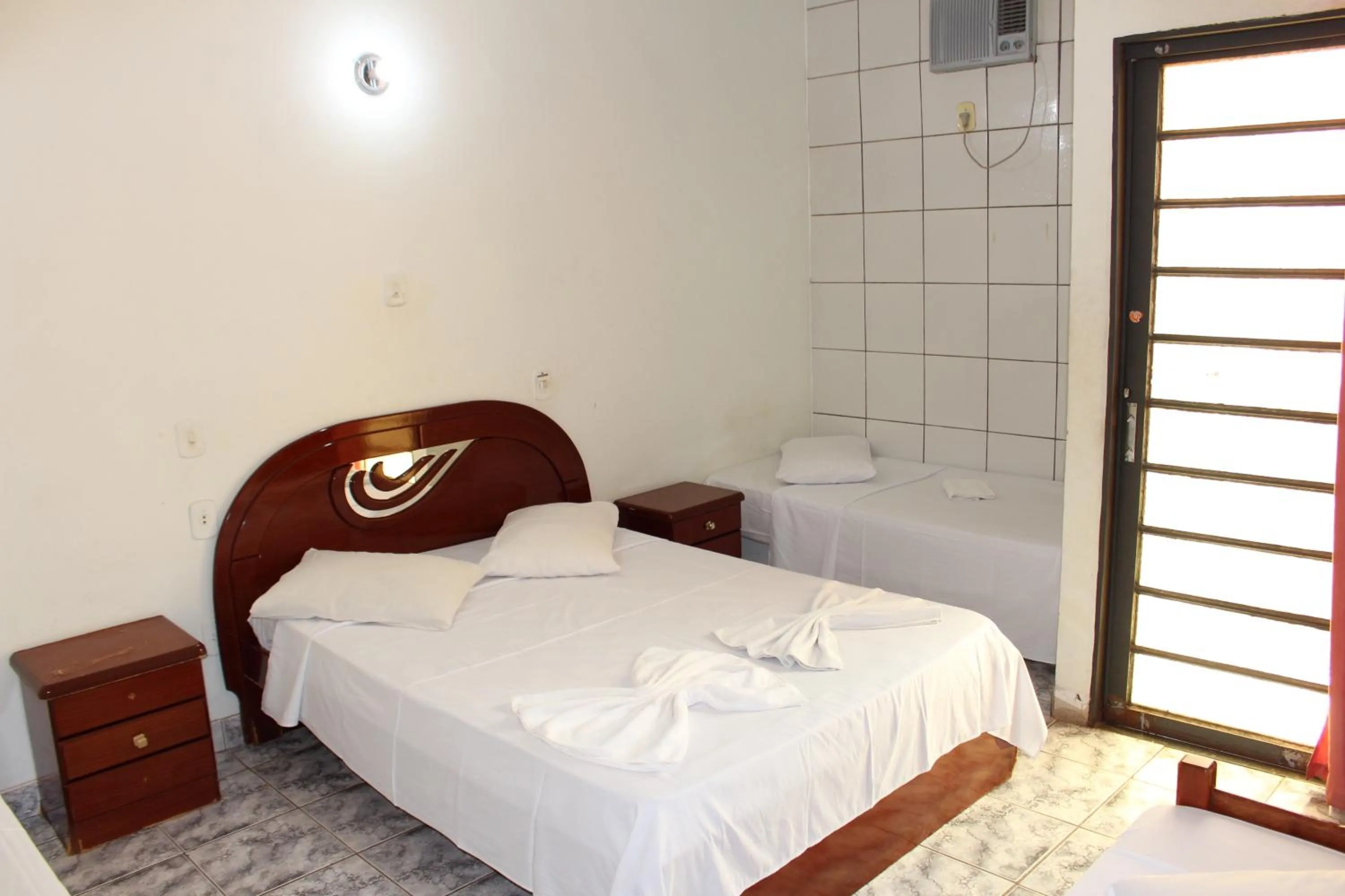 Bed in Bica Pau Hotel