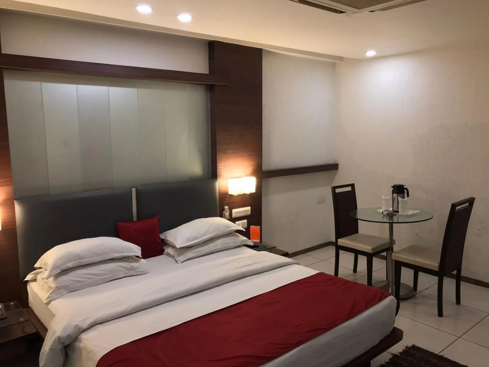 Bed in Pearl Hotel & Banquets Ahmedabad