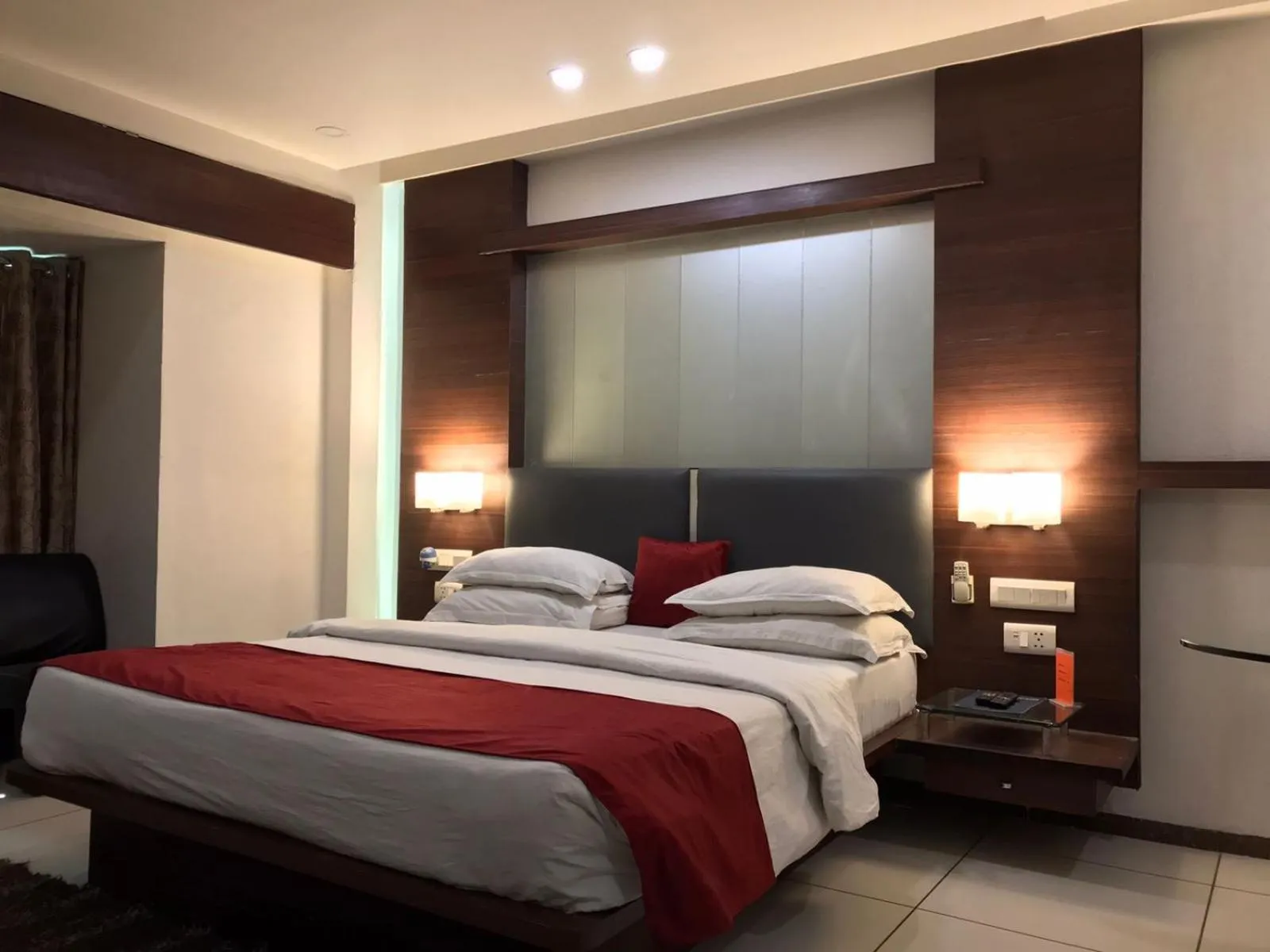 Bed in Pearl Hotel & Banquets Ahmedabad