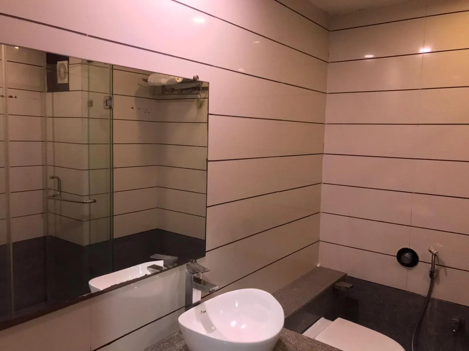 Bathroom in Pearl Hotel & Banquets Ahmedabad