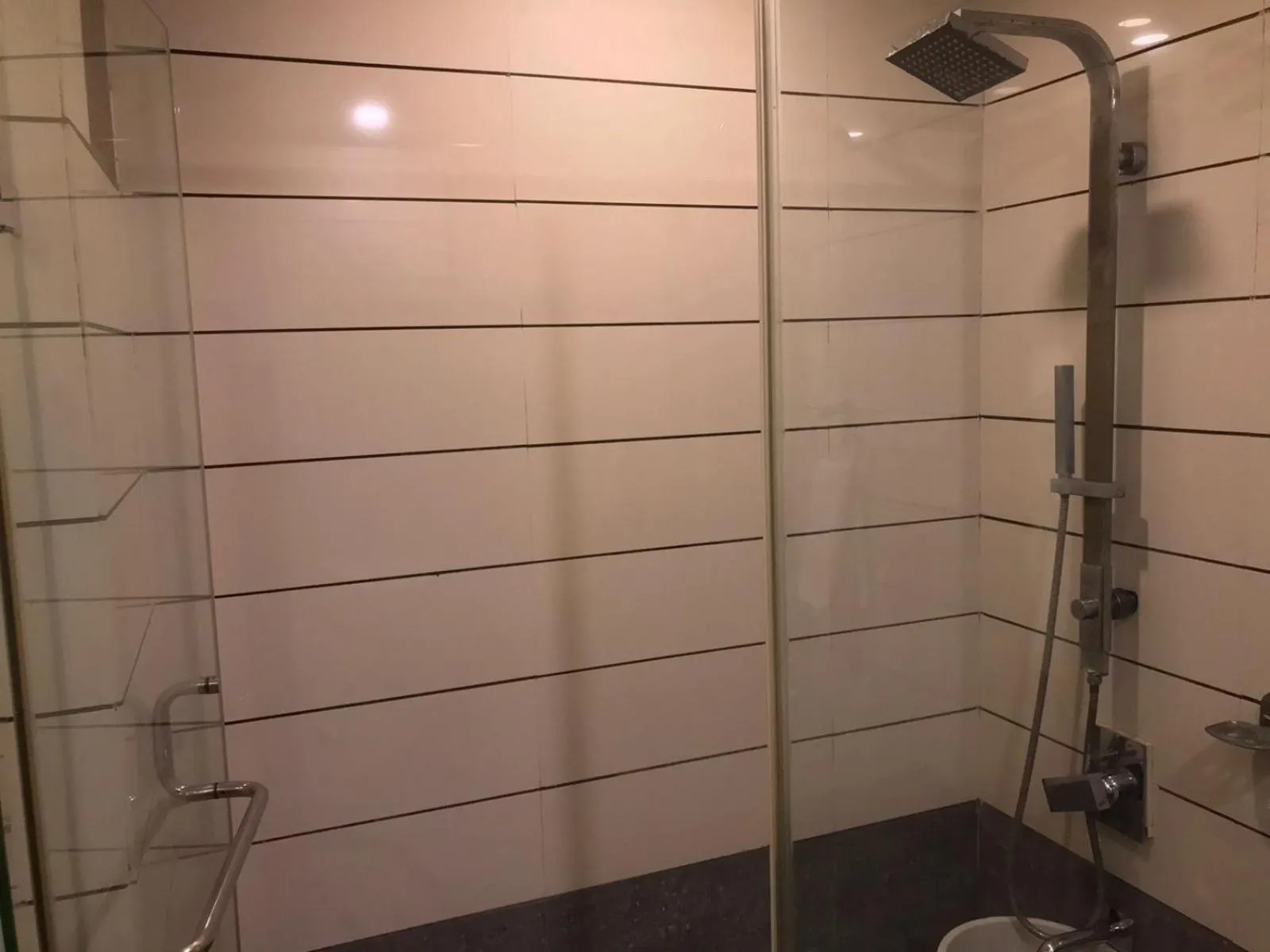 Bathroom in Pearl Hotel & Banquets Ahmedabad