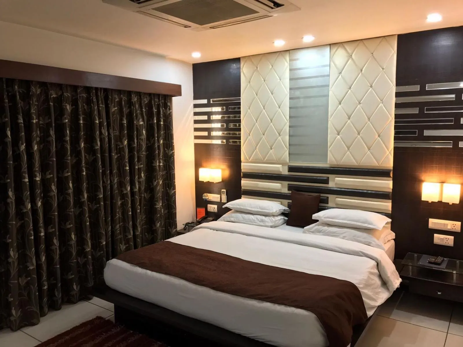 Bed in Pearl Hotel & Banquets Ahmedabad