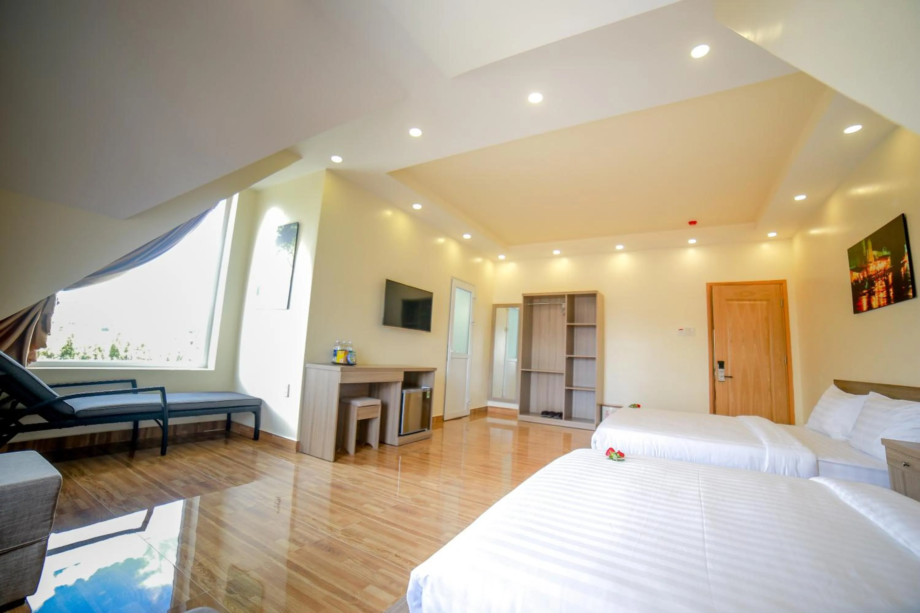 Photo of the whole room, Bed in Nhật Nguyên Hotel