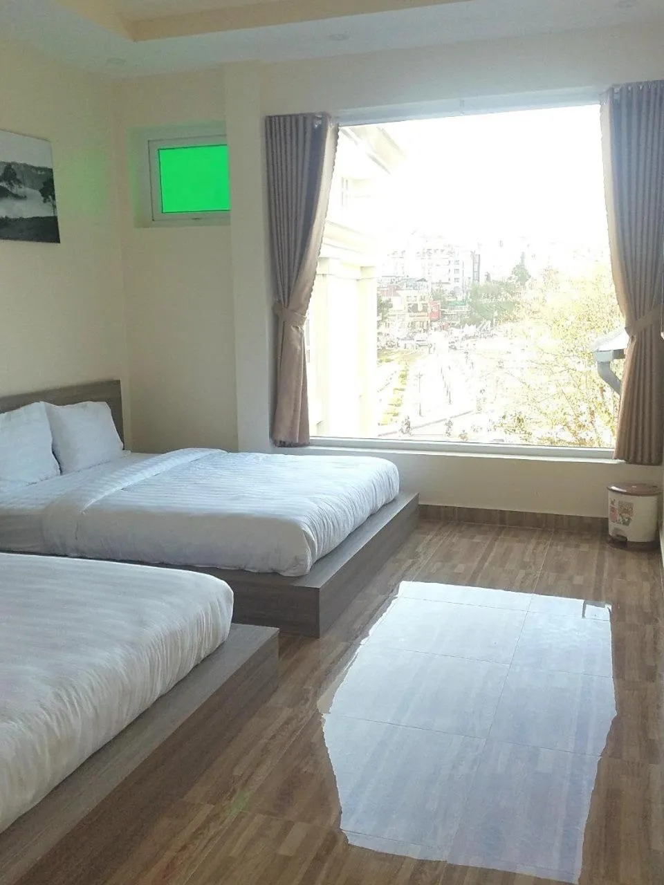 Photo of the whole room, Bed in Nhật Nguyên Hotel