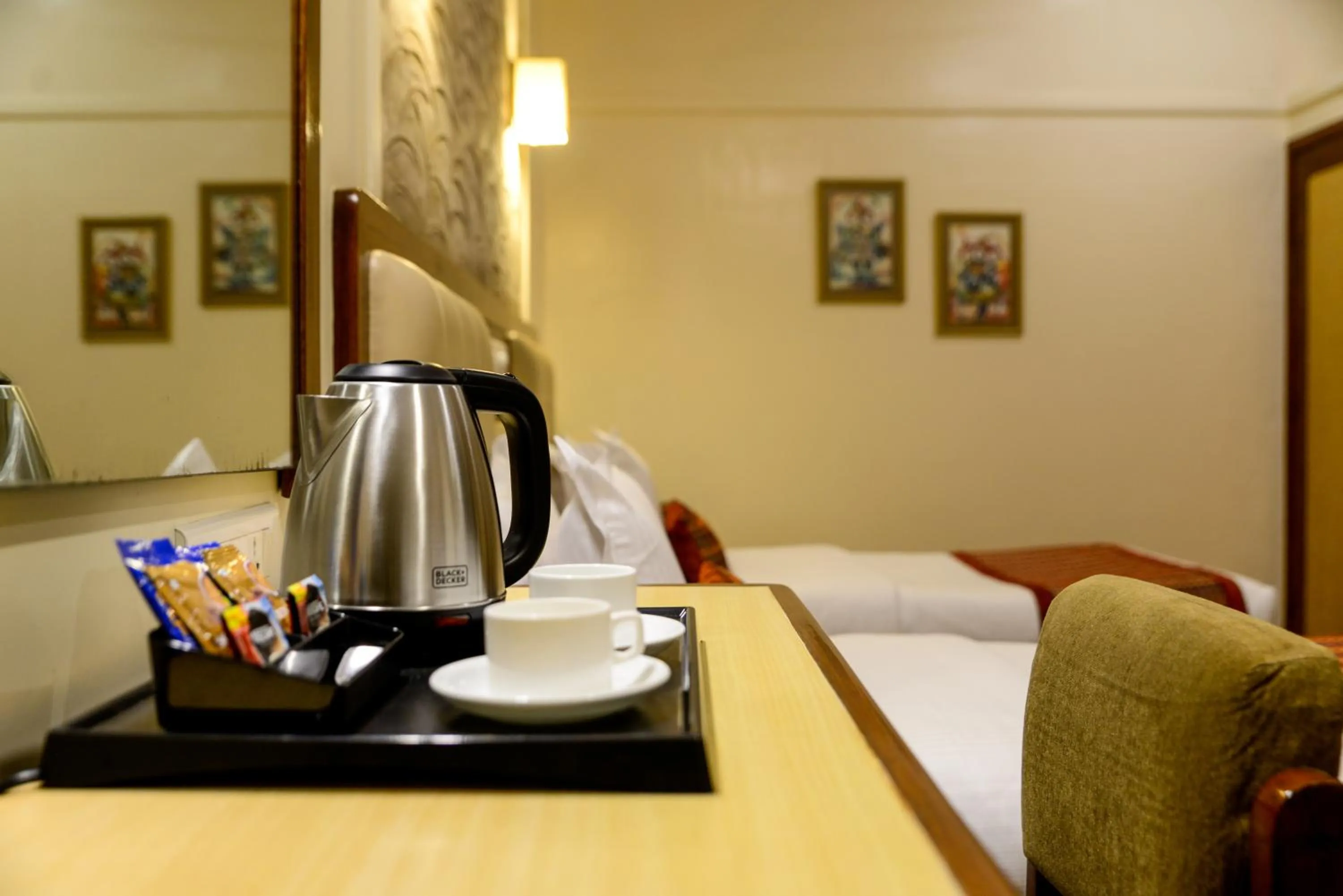 Coffee/tea facilities, Bed in Hotel Ameya