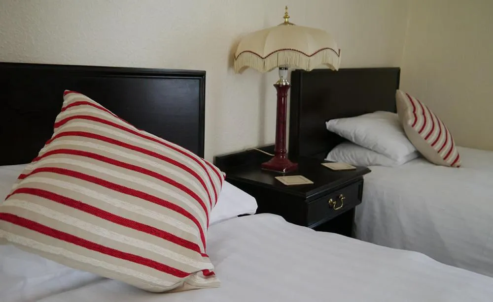 Decorative detail, Bed in The White Hart Hotel