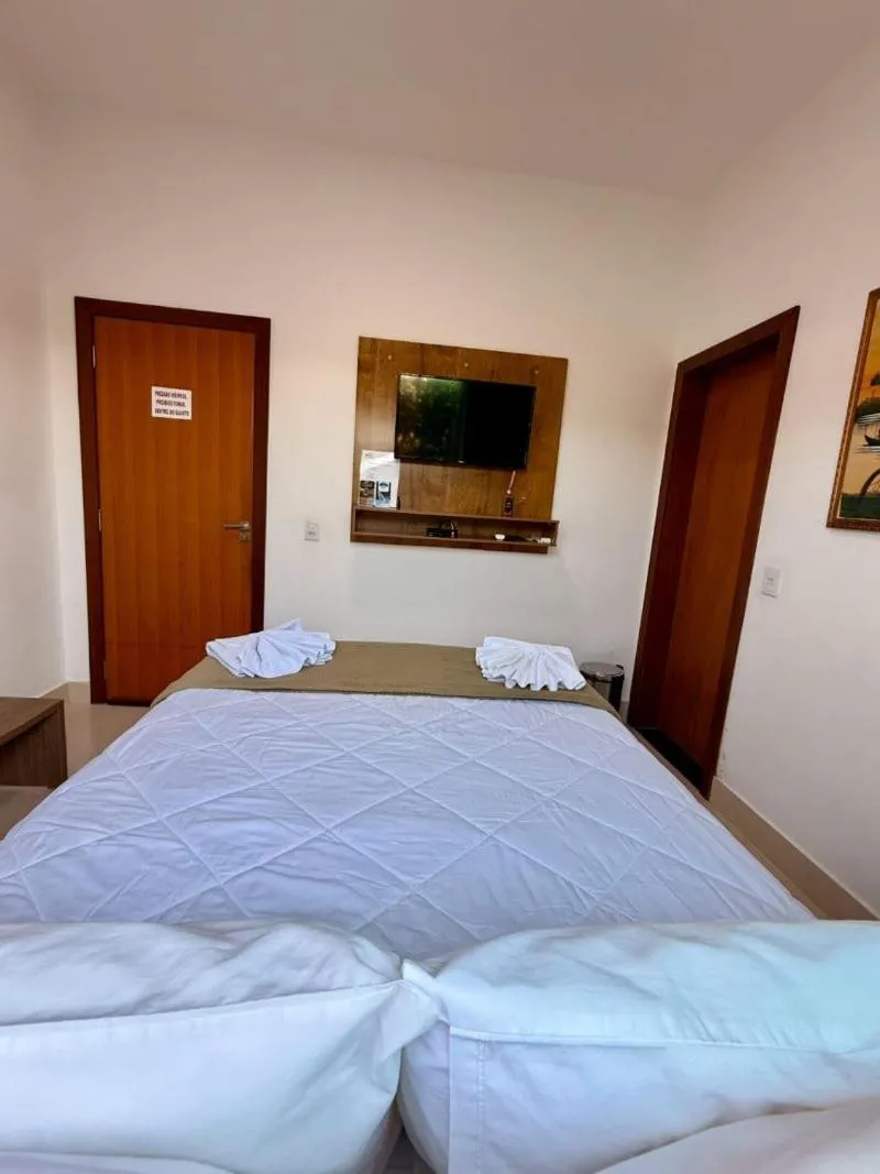 Bed in POUSADA RECANTO DAS VERTENTES