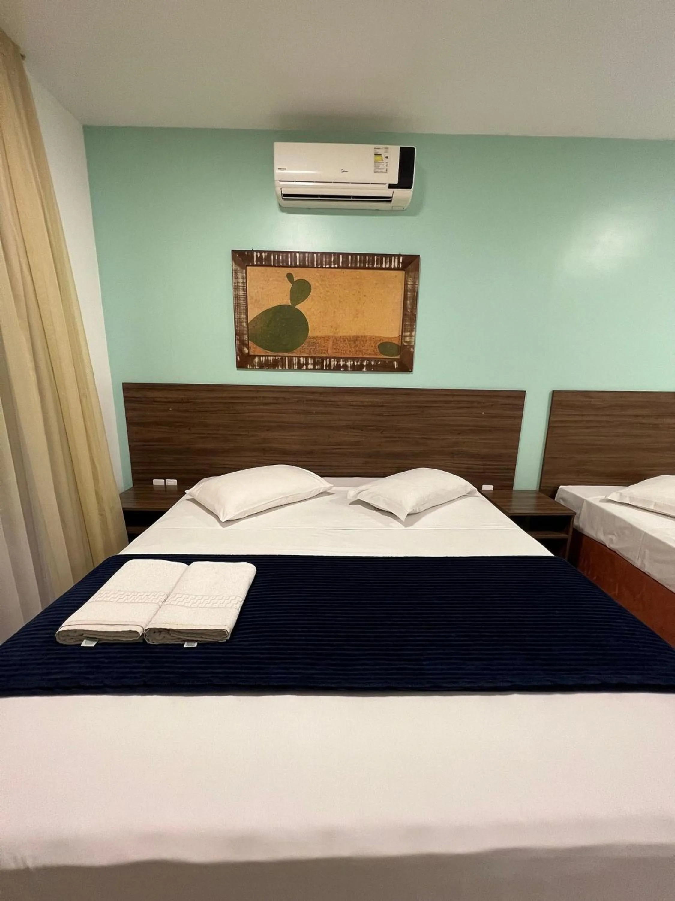 Bed in Pousada Bernúncia - Com café da Manhã, próximo a Praia Grande