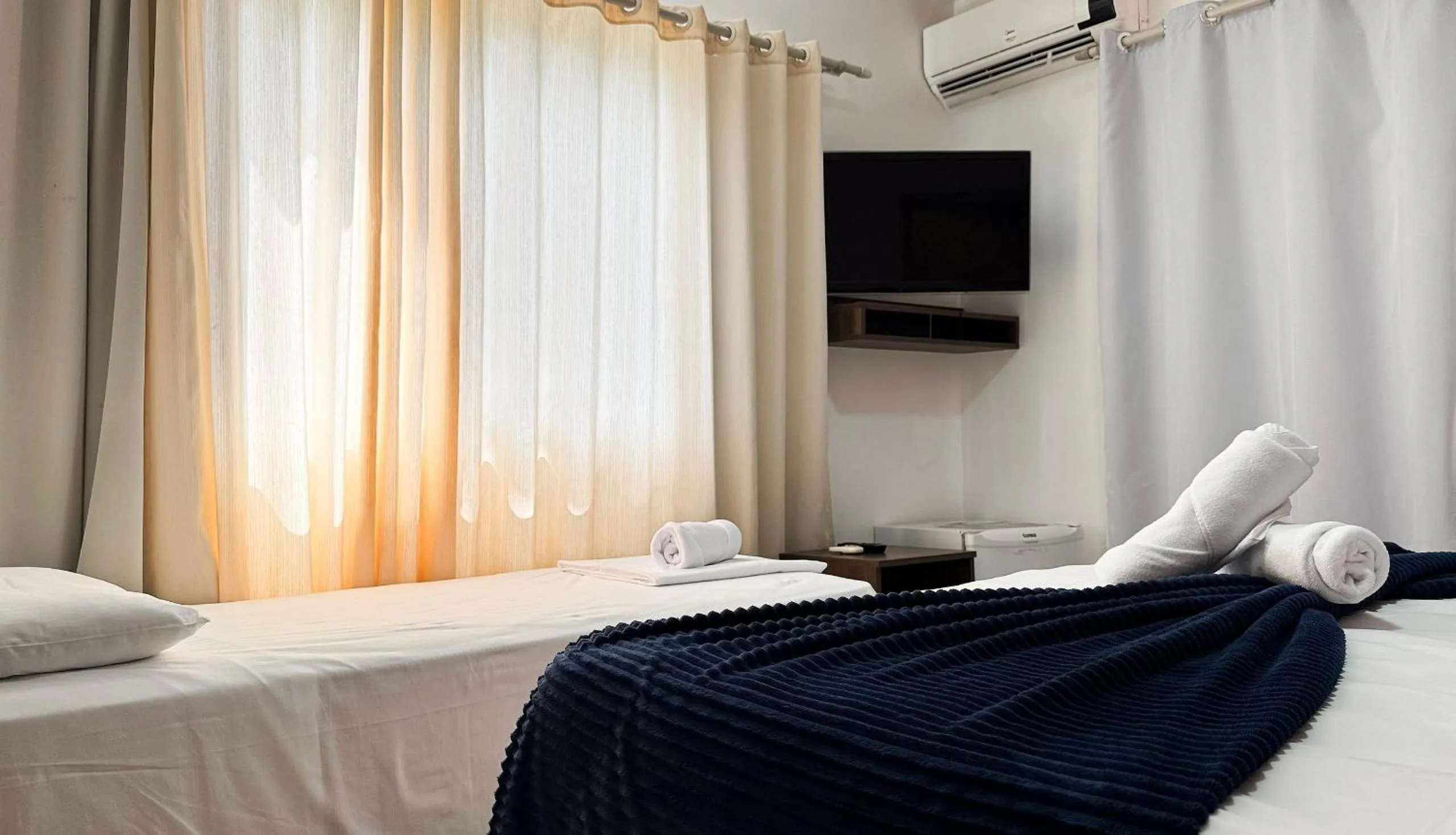 Bed in Pousada Bernúncia