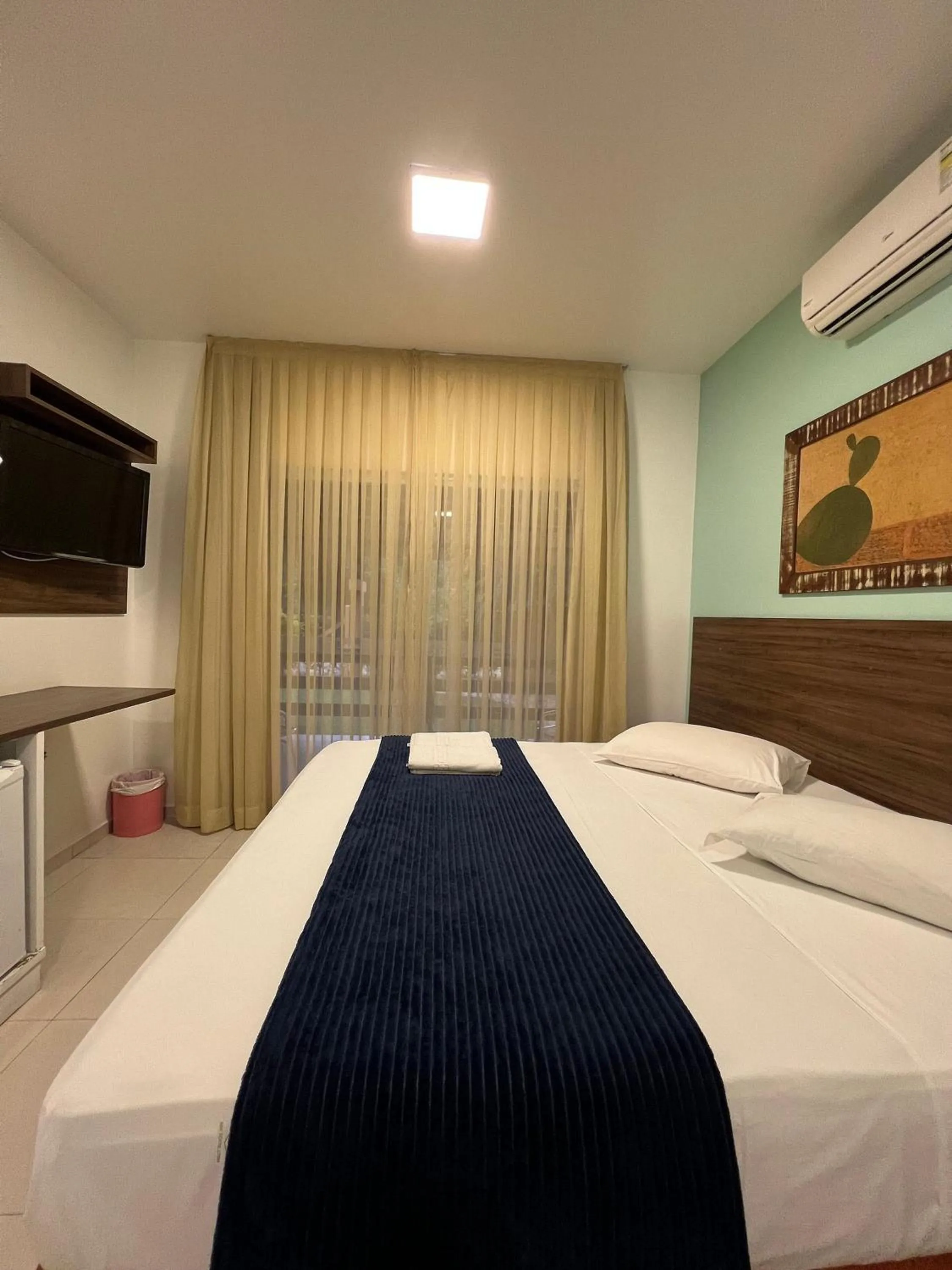 Bed in Pousada Bernúncia - Com café da Manhã, próximo a Praia Grande