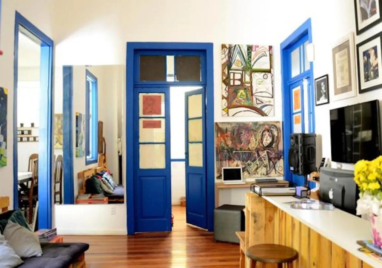 Communal lounge/ TV room in Brasileranza Hostel