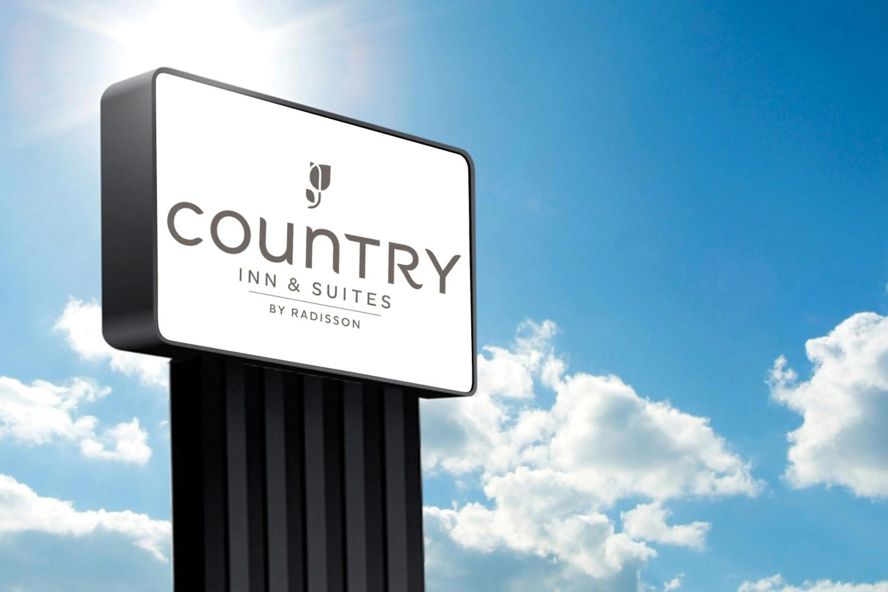 Property logo or sign in Country Inn & Suites by Radisson, Dunbar - Charleston