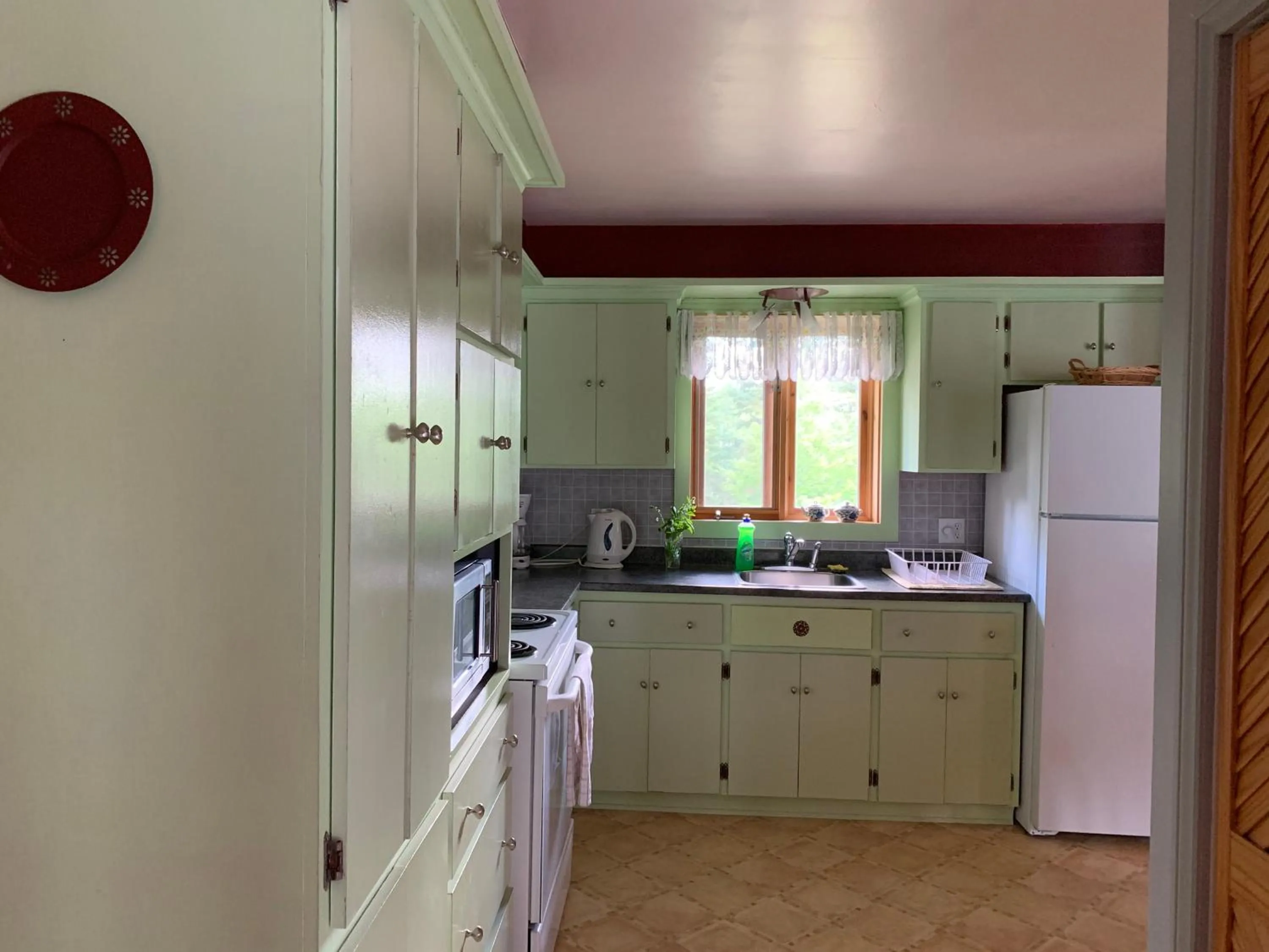 Kitchen or kitchenette in L'Auberge Refuge du Trappeur