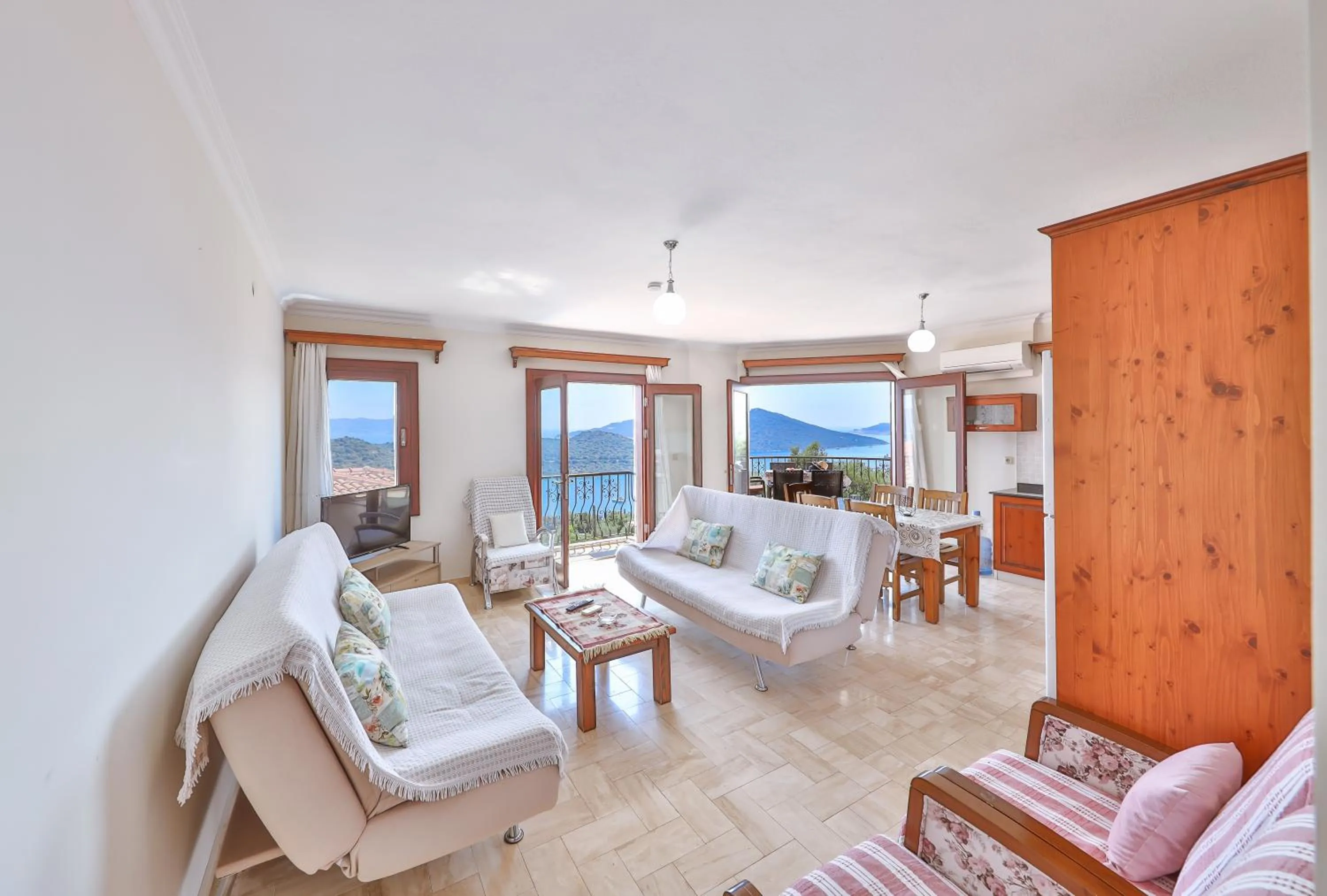 Living room, Bed in Nirvana Apartments