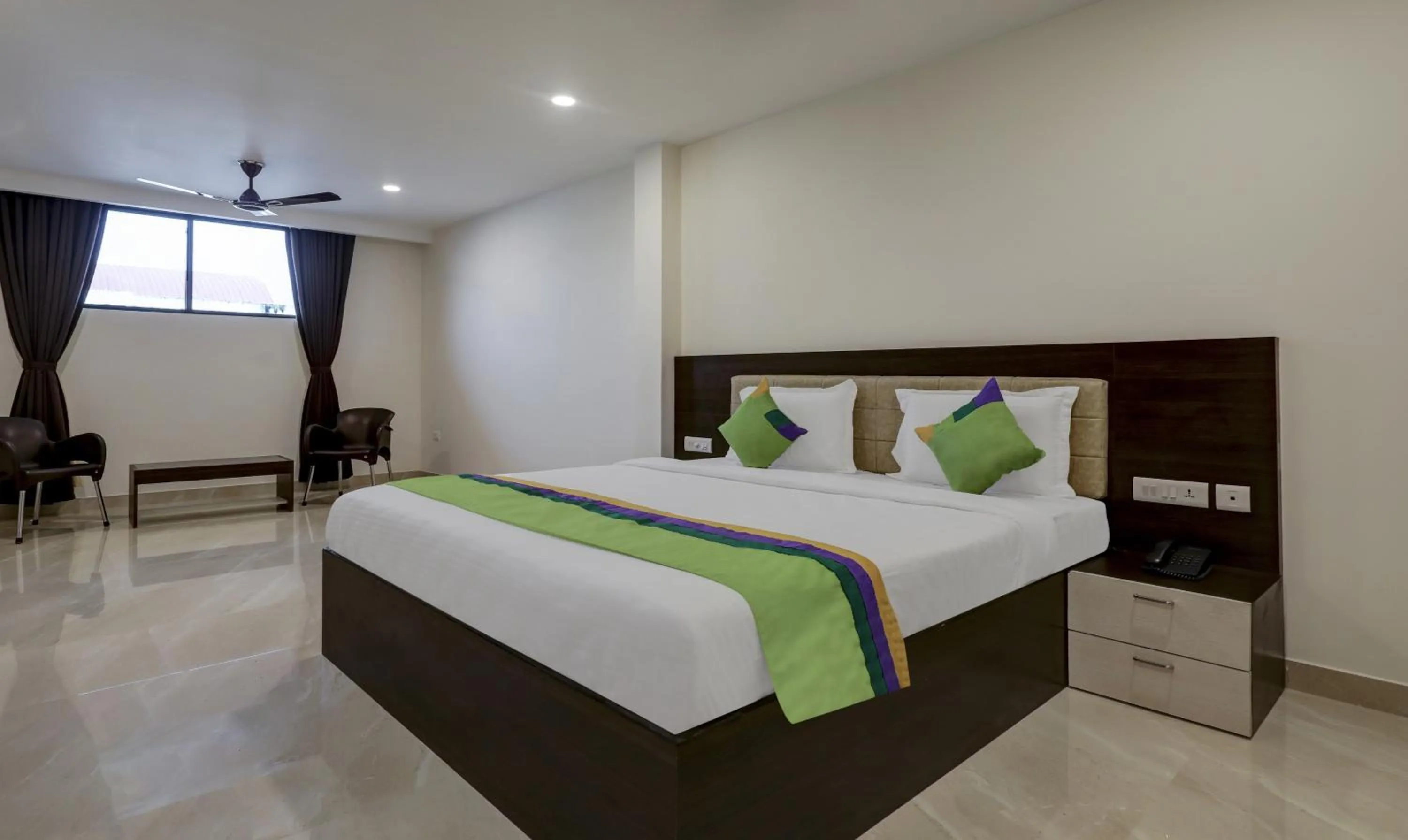 Photo of the whole room, Bed in Treebo The Horizon Kankanady