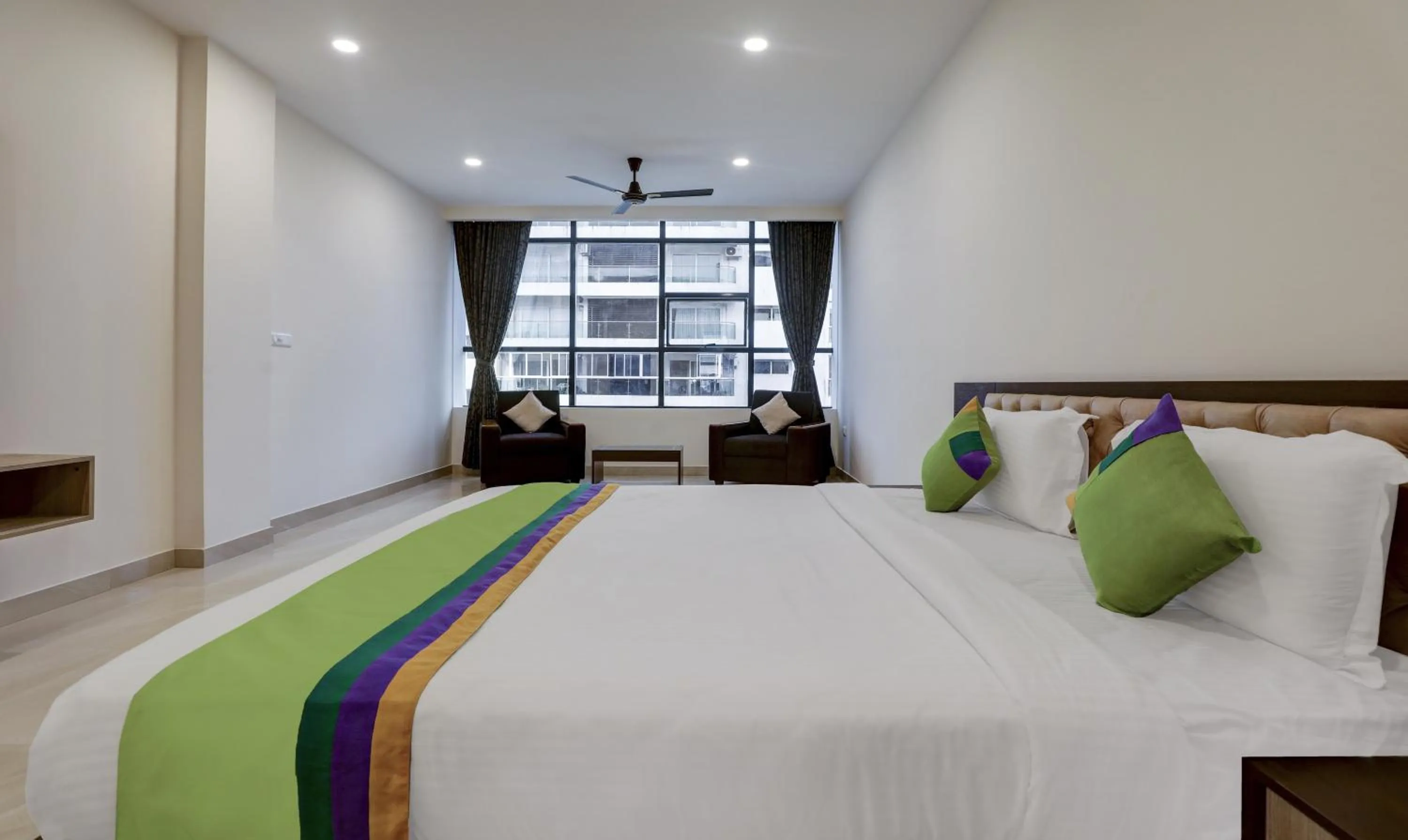 Photo of the whole room, Bed in Treebo The Horizon Kankanady