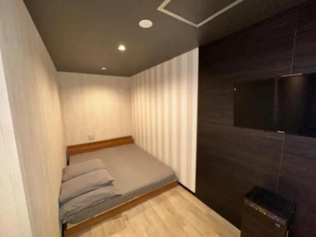 Bed in Hotel Capsule Inn Shizuoka