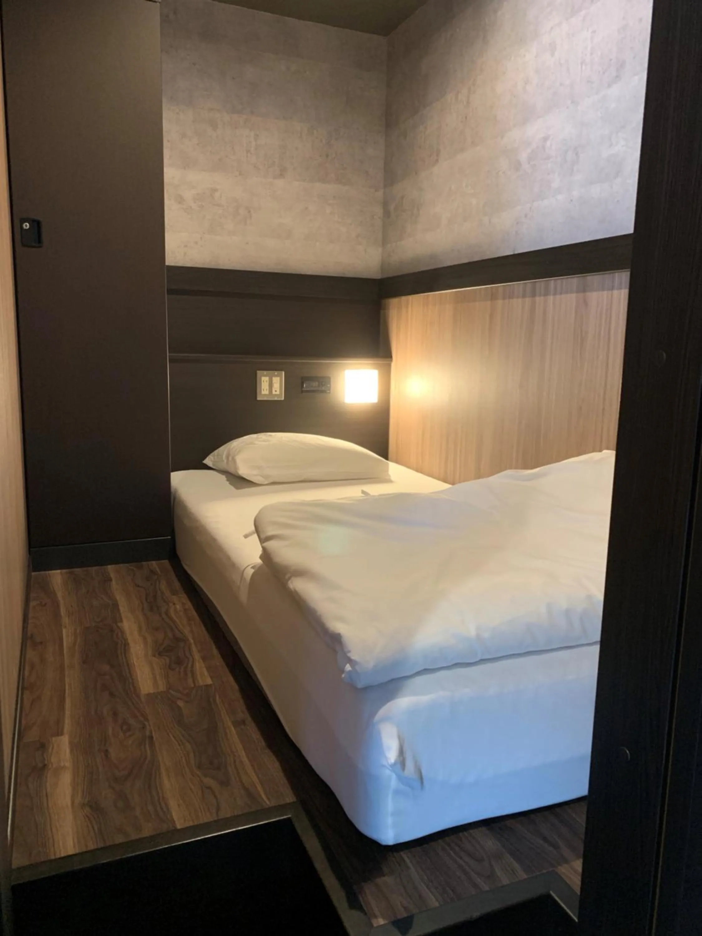 Bed in Hotel Capsule Inn Shizuoka