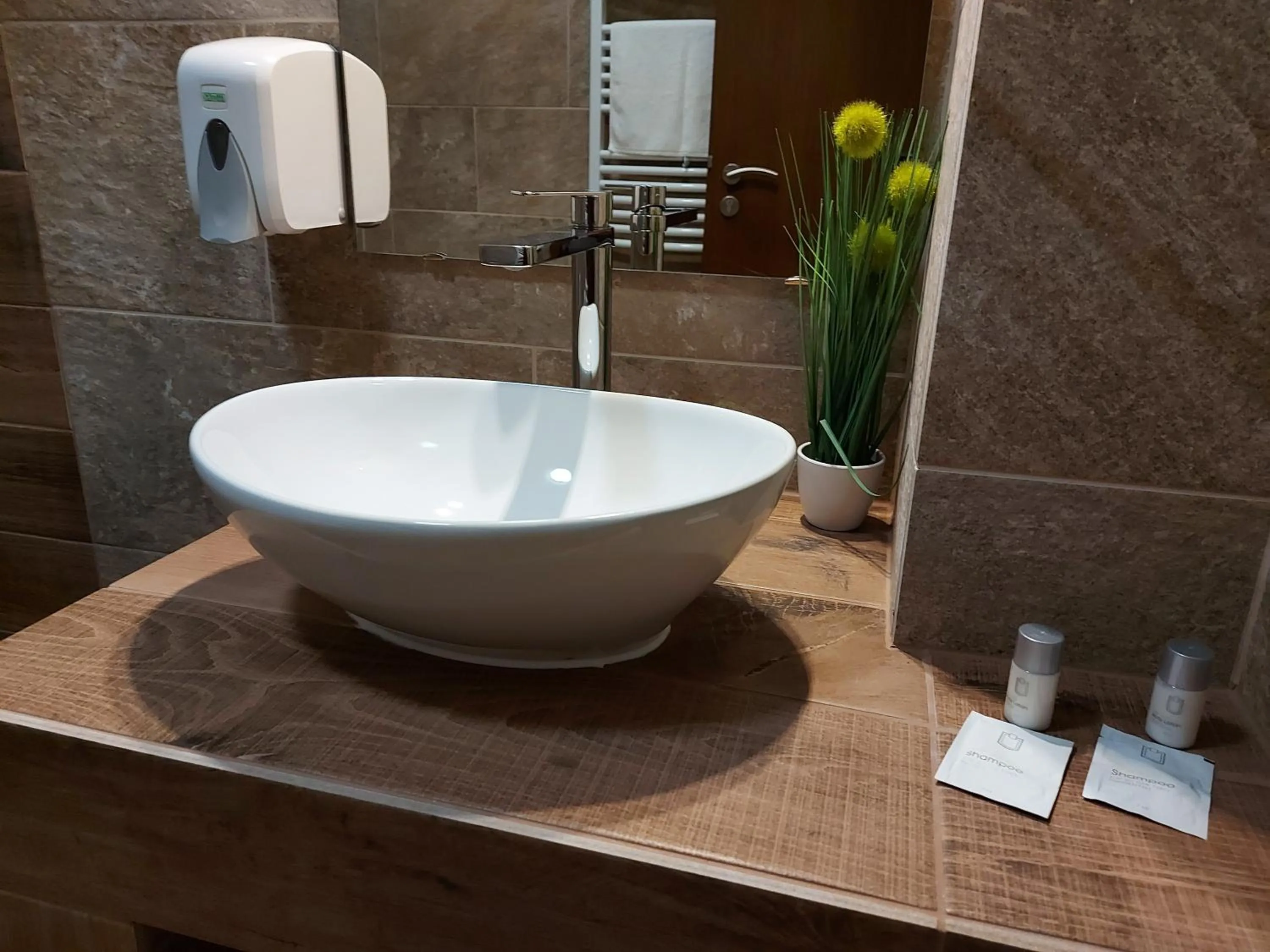 Bathroom in Vén Diófa De Lux Panzió