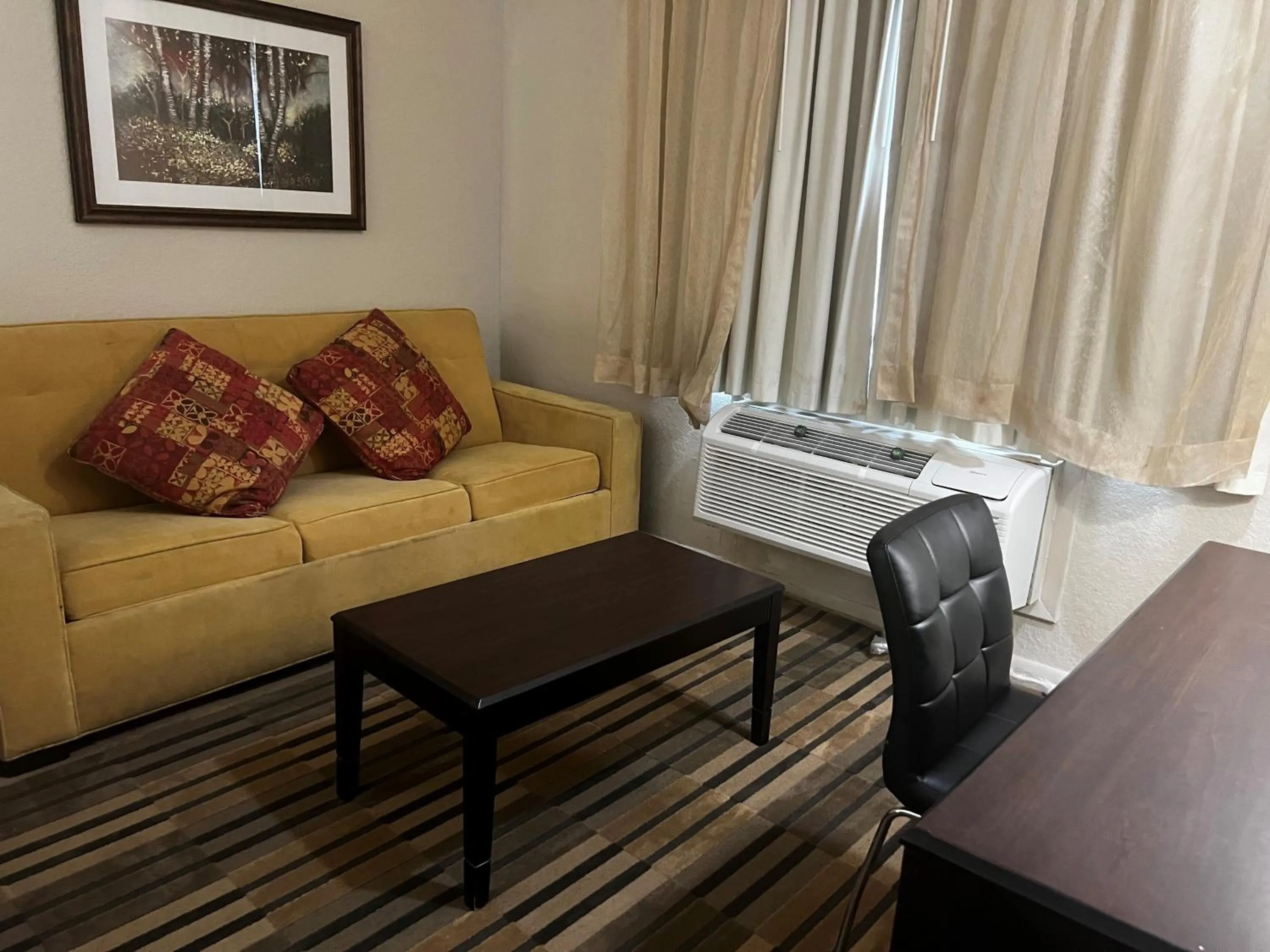 Seating area in Baymont by Wyndham Houston/Westchase