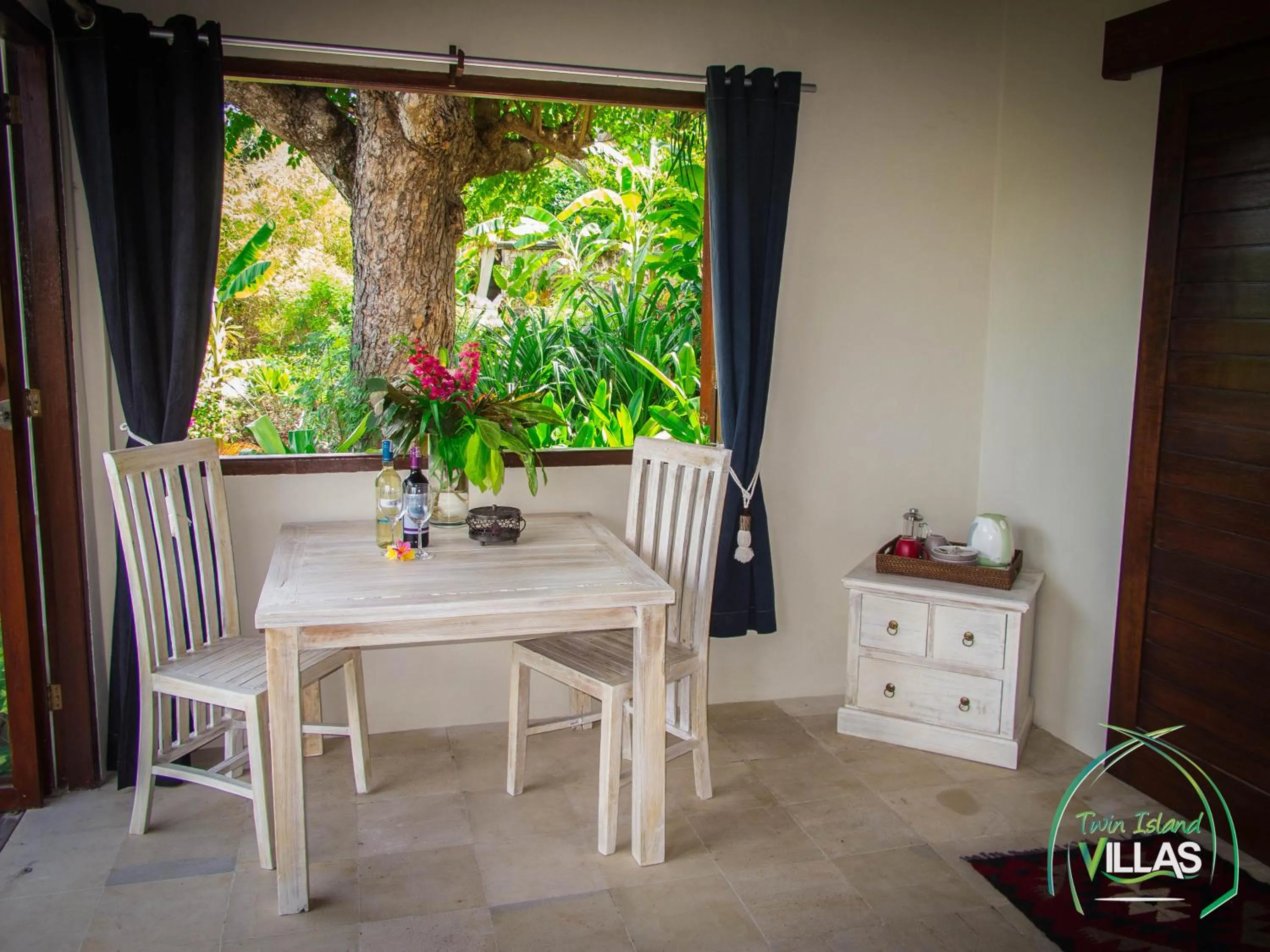 Dining area in Twin Island Villas & Dive Resort