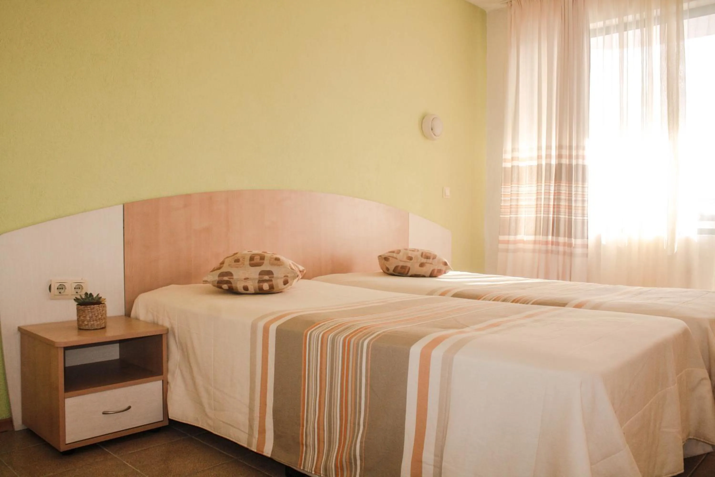 Bed in Alba Family Club Hotel