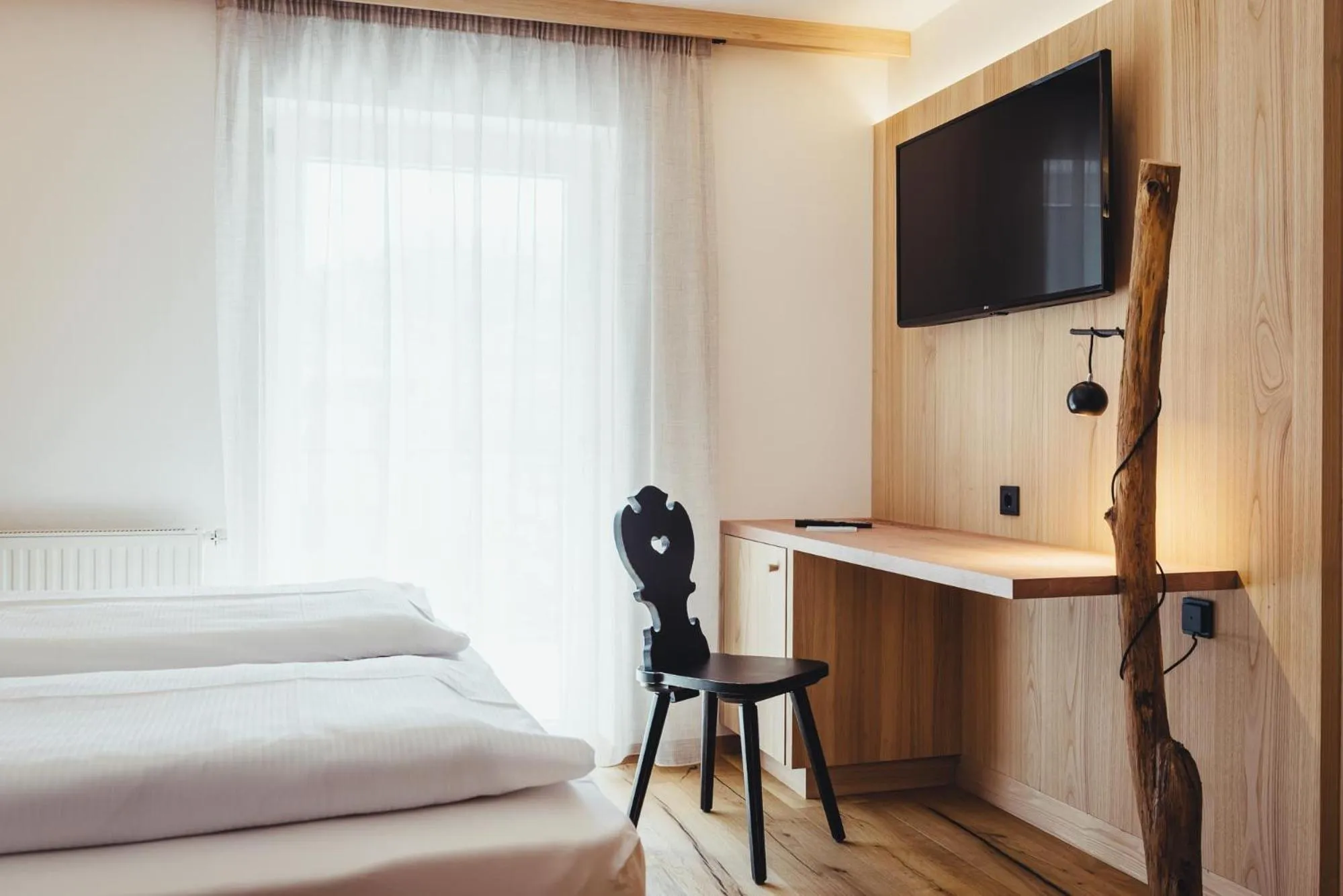 Photo of the whole room, Bed in Weingut & Genusshotel Spitalerhof Superior