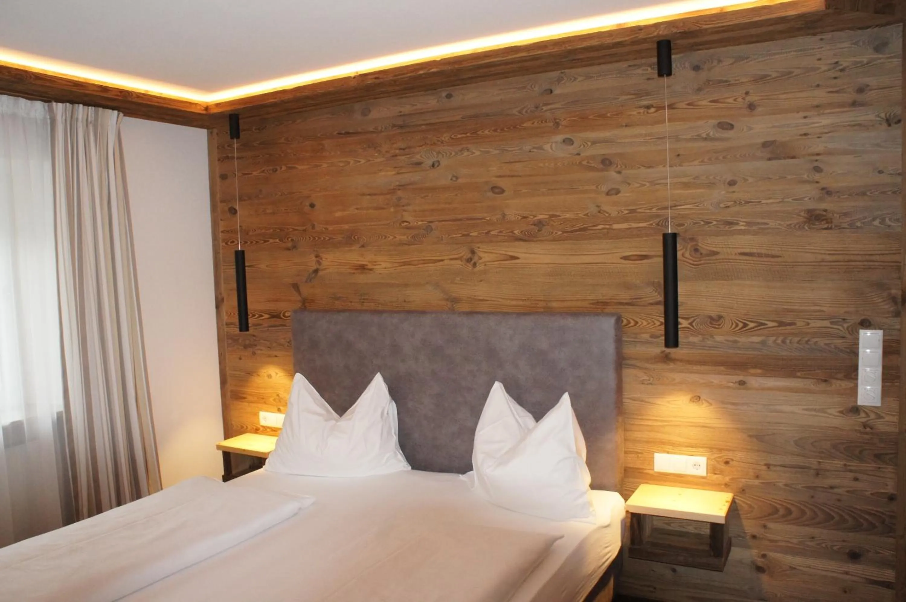 Photo of the whole room, Bed in Weingut & Genusshotel Spitalerhof Superior