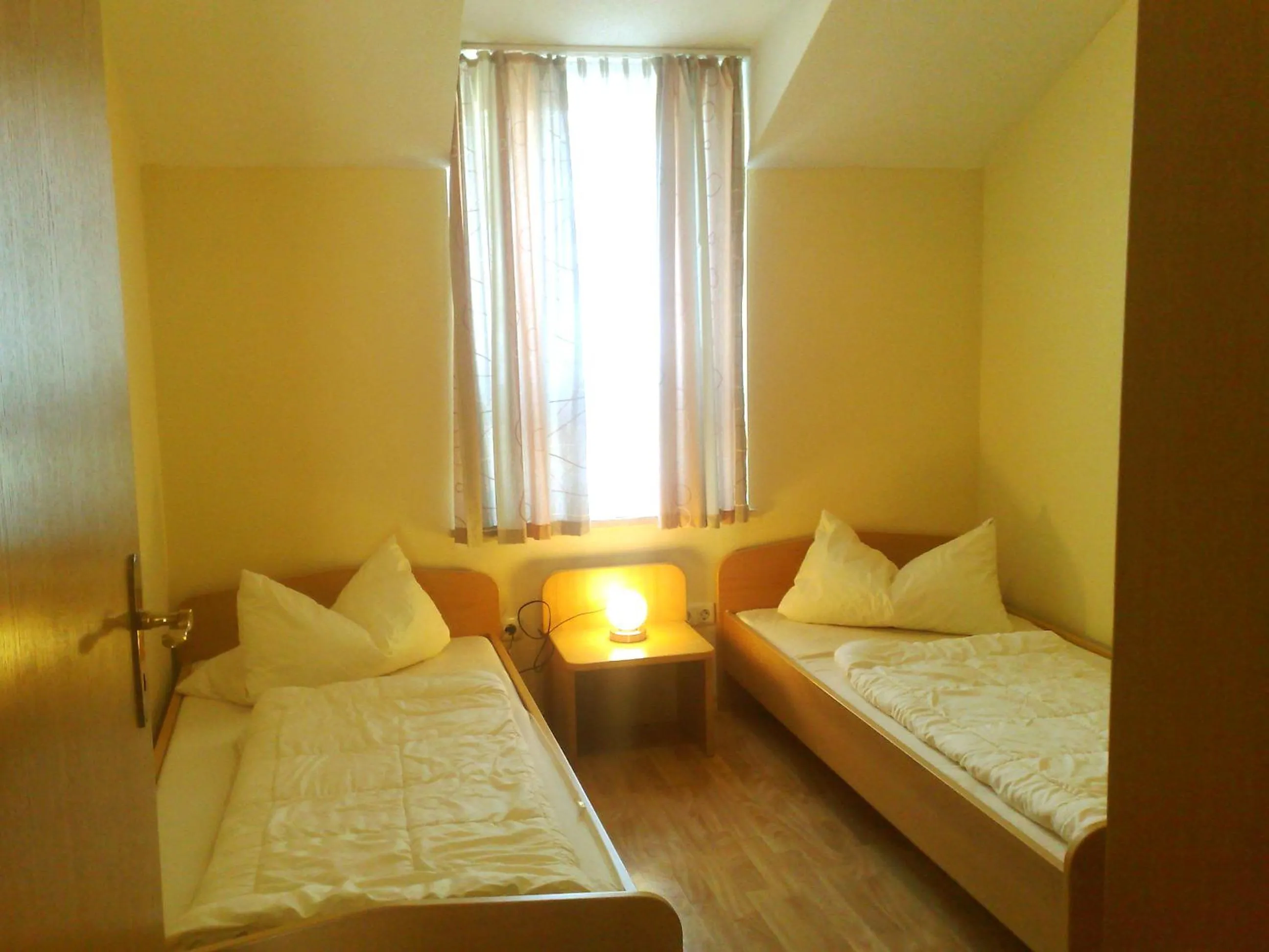 Bed in Ferienresidenz Am weißen Regen