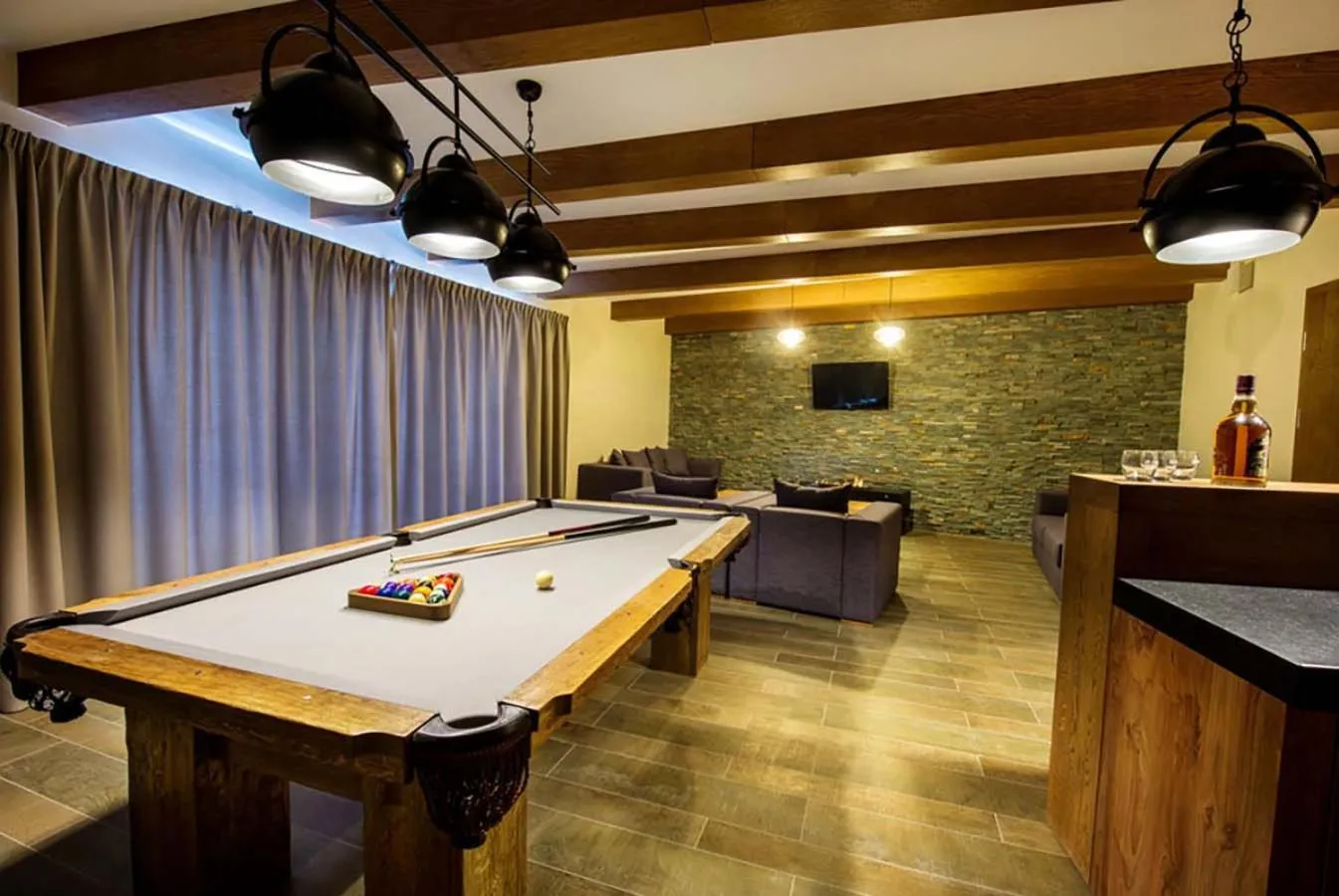 Communal lounge/ TV room in Hotel Arłamów