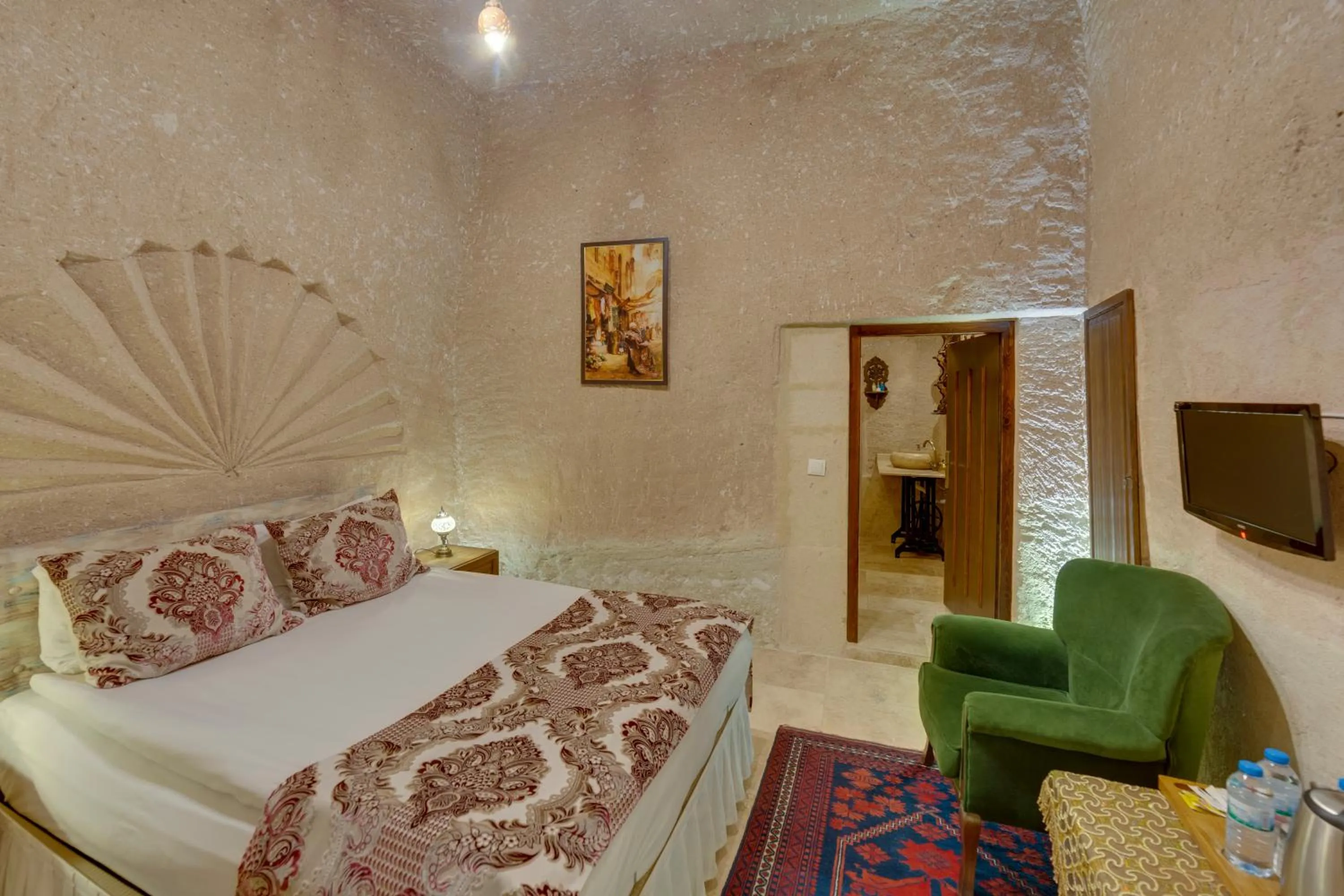 Living room, Bed in Cappadocia Abras Cave Hotel