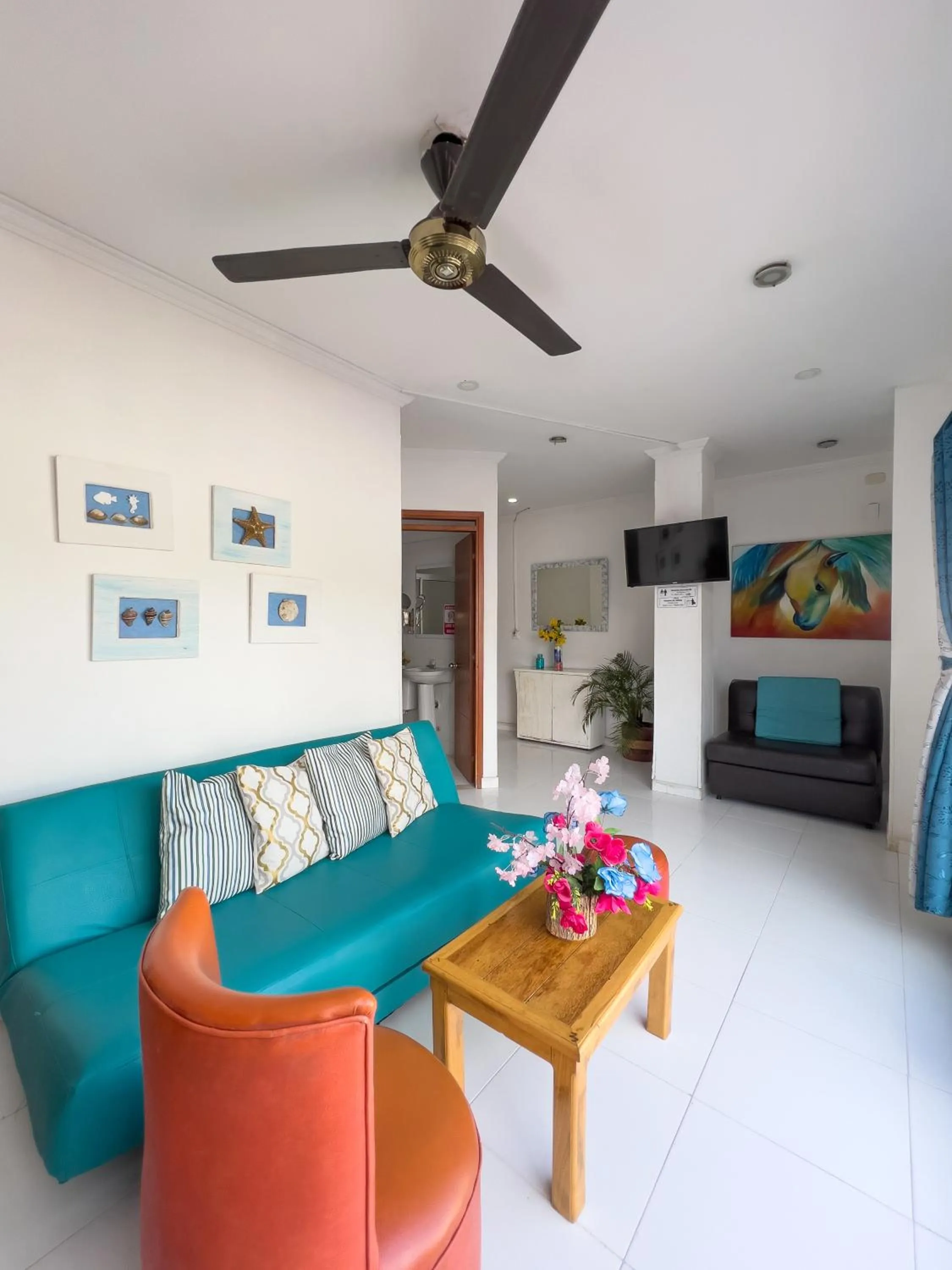 Living room, Bed in Apartamentos Playa Rodadero