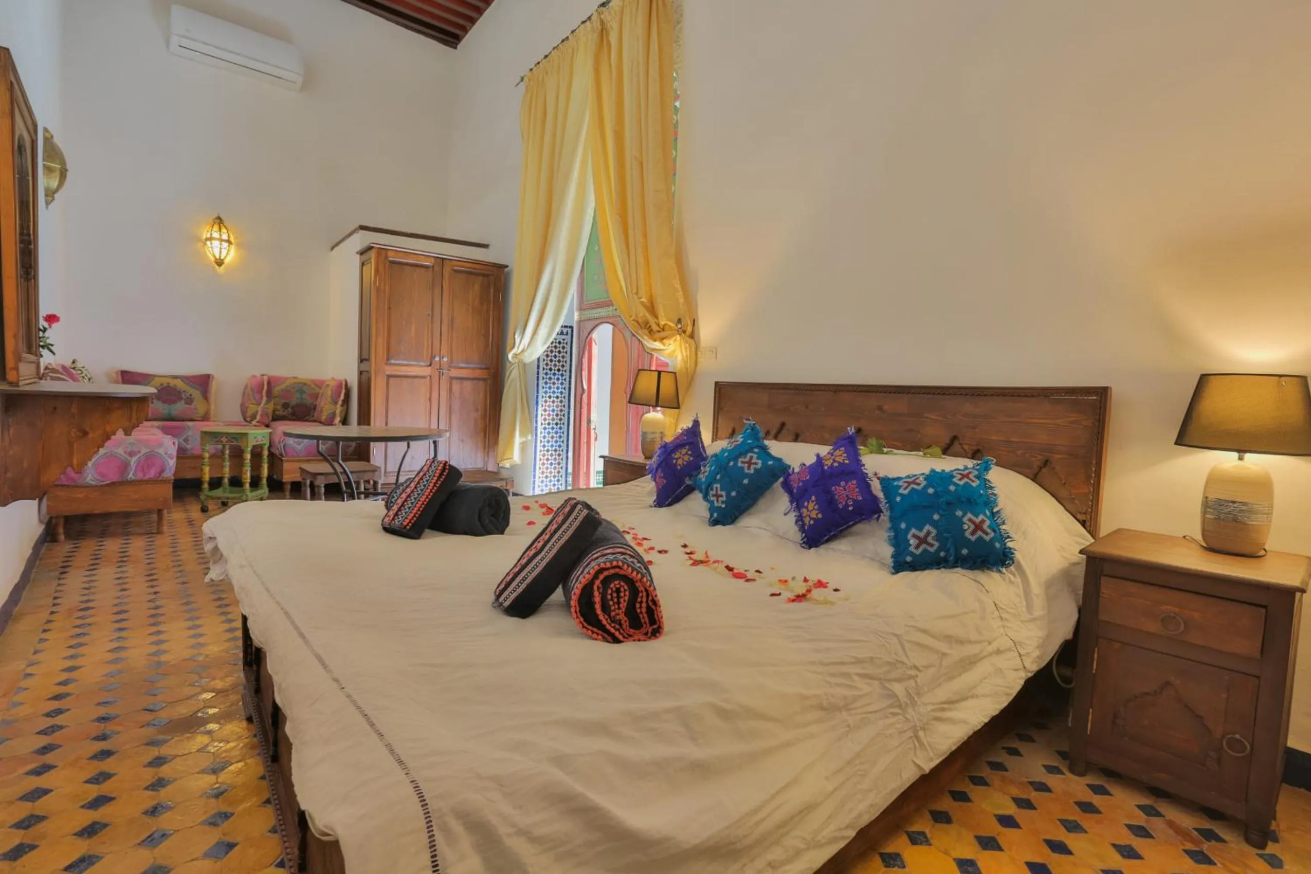 Bed in Riad Zina Fes - Elegance in the Heart of Fes