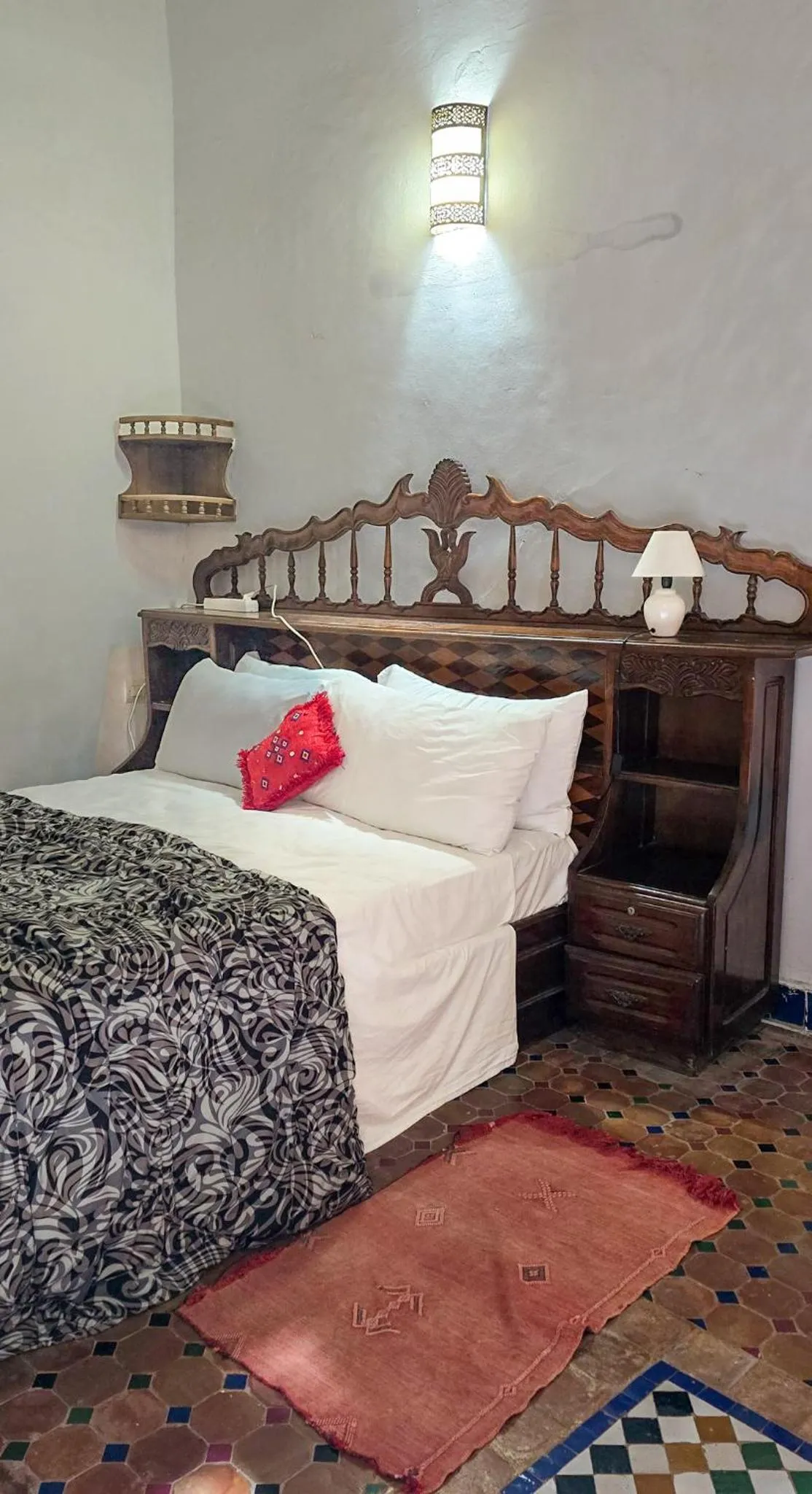 Bed in Riad Zina Fes - Elegance in the Heart of Fes