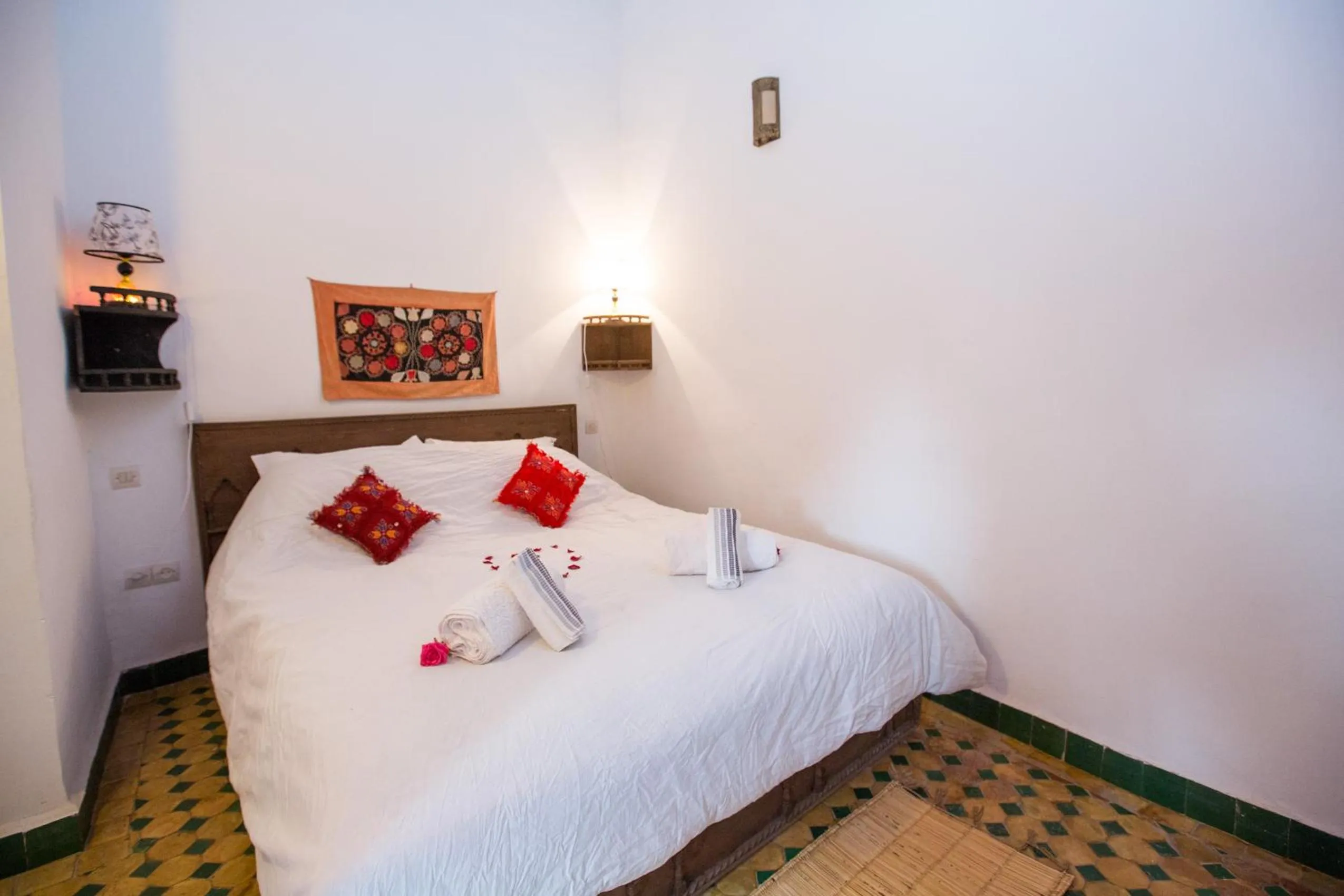 Bed in Riad Zina Fes - Elegance in the Heart of Fes